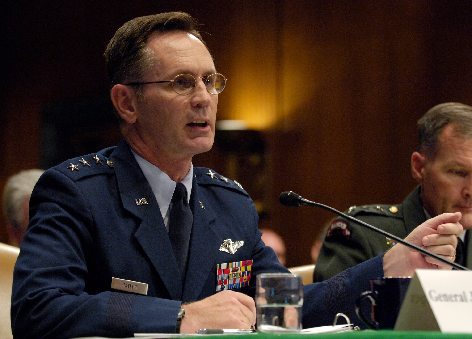 WASHINGTON -- Air Force Surgeon General Lt. Gen. (Dr.) George Peach Taylor Jr. answers questions from members of the Base Realignment and Closure Commission during a hearing Aug. 20 on Capitol Hill.  The commission called the hearing to give members of the Defense Department a final opportunity to present testimony before the commission's final deliberations concerning their BRAC recommendations to the president.  (U.S. Air Force photo by Master Sgt. Jim Varhegyi)