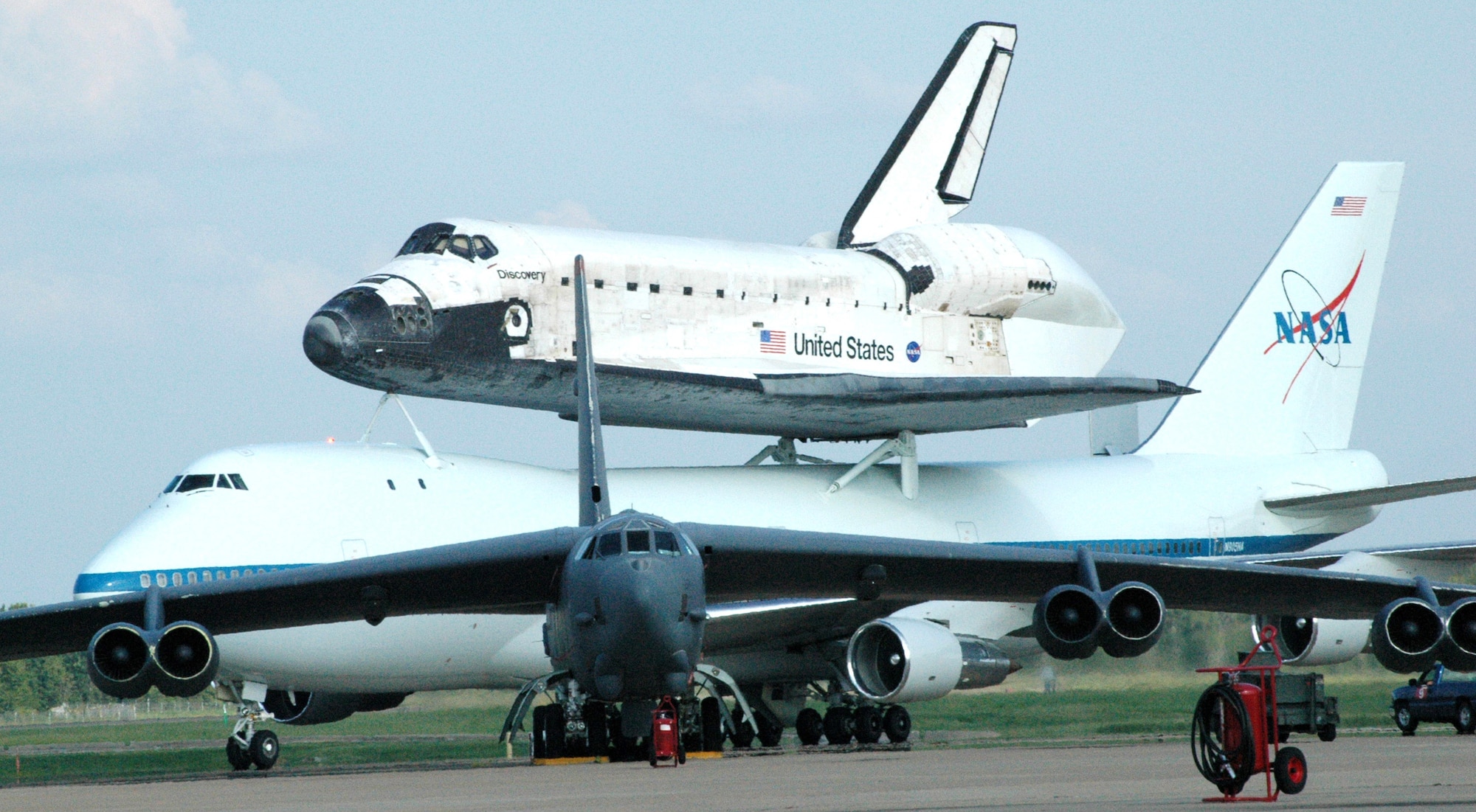 BARKSDALE AIR FORCE BASE, La. -- A NASA Boeing 747 carrying Space Shuttle Discovery, still scorched from its re-entry into Earth's atmosphere, taxis here Aug. 19.  Discovery's stop was the second of two as the shuttle was on its way back to Kennedy Space Center, Fla. (U.S. Air Force photo by Airman 1st Class Brandon Kusek)