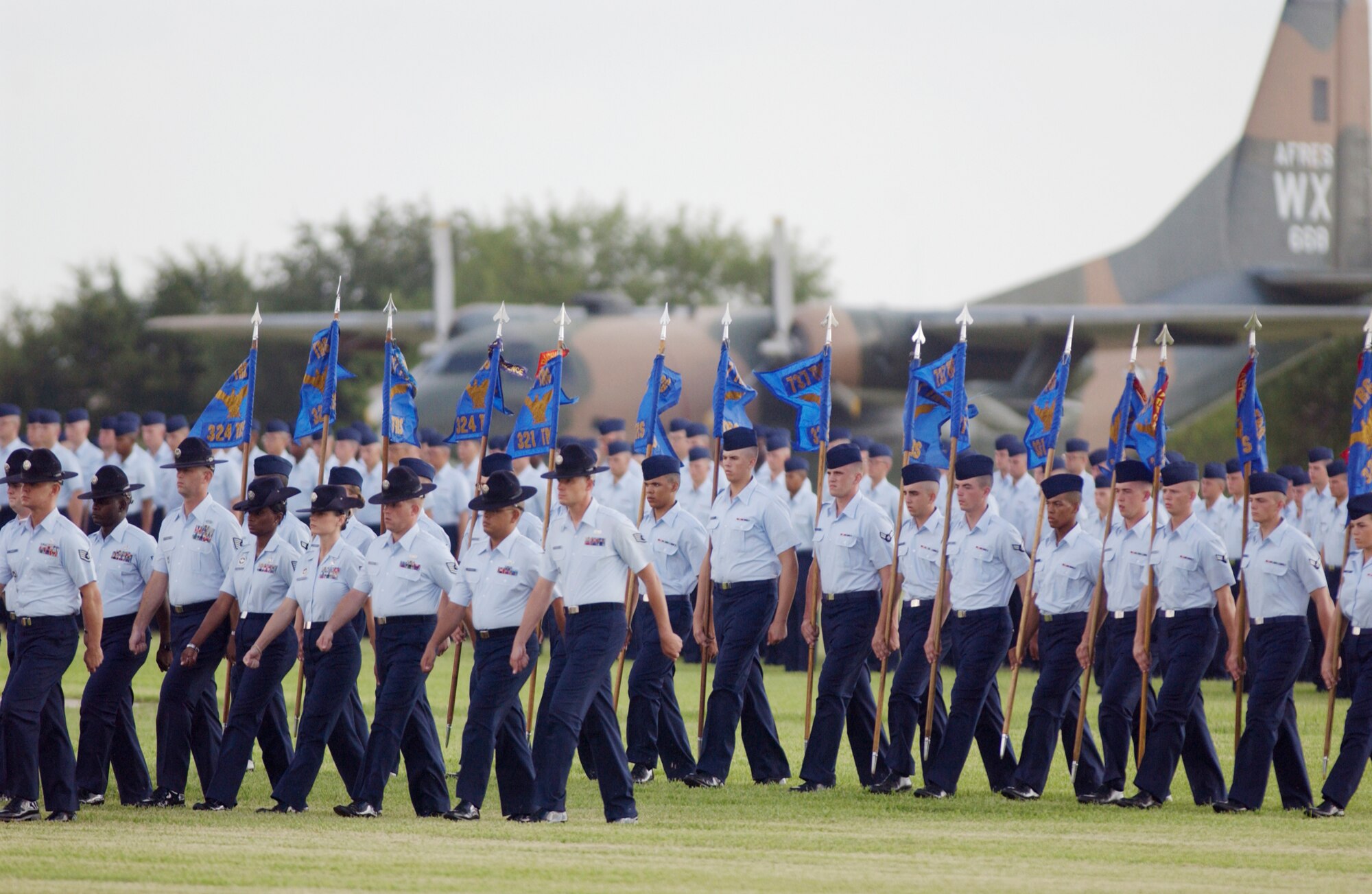 LACKLAND AIR FORCE BASE, Texas -- Airmen participate in a rite of passage shared by all enlisted Airmen -- the Basic Military Training graduation parade.  The parade of 15 squadrons marked the end of the six-week training period for about 750 of the Air Force's newest Airmen.  (U.S. Air Force photo by Master Sgt. Ken Wright)