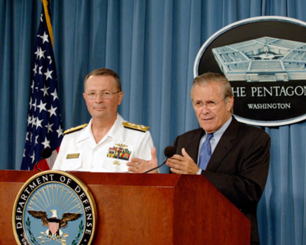 Secretary of Defense Donald H. Rumsfeld responds to a reporter's question during an press briefing with Vice Chairman of the Joint Chiefs of Staff Adm. Edmund Giambastiani, U.S. Navy, in the Pentagon on Aug. 23, 2005. 