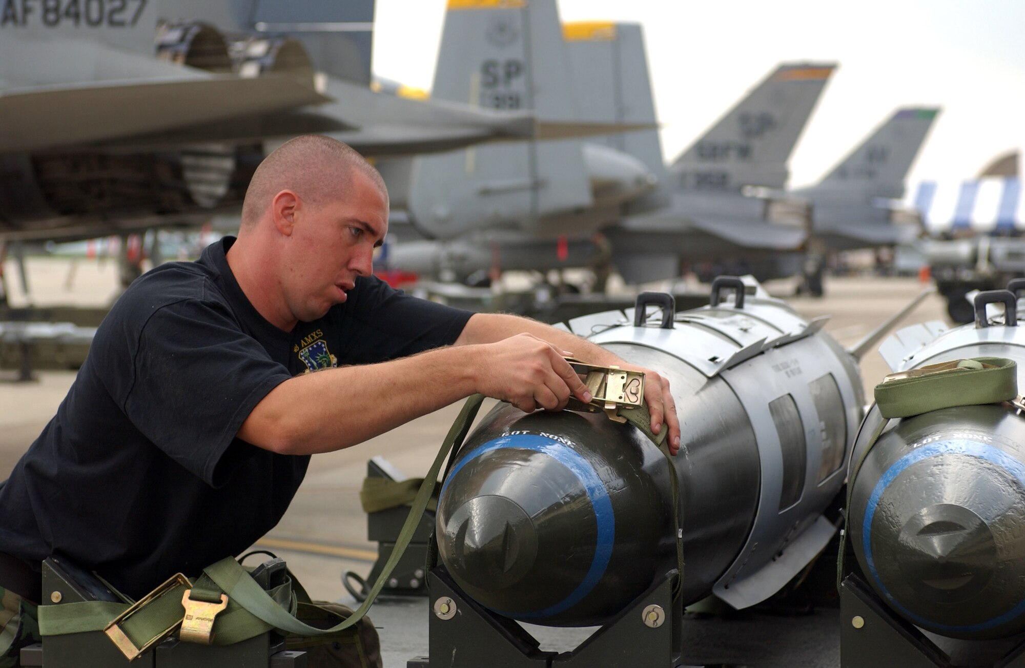 SPANGDAHLEM AIR BASE, Germany -- Senior Airman Kevin Rayburn competes in the Sure Fire Load Competition on Aug. 24.  Airman Rayburn is assigned to the 48th Aircraft Maintenance Squadron at Royal Air Force Lakenheath, England. (U.S. Air Force photo by Airman 1st Class Kristin Ruleau)  