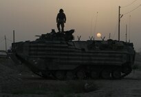 The battalion sergeant major for the Chemical Biological Incident Response Force (CBIRF), Sgt. Maj. Thomas W. Murphy (left), extracts a casualty from the collapsed structure trainer while negotiating a high-pressure water leak at the Raymond M. Downey Sr. Training Facility located in Indian Head, Md., August 25.  Every Marine and Sailor stationed at the unit, regardless of rank, is required to attend a two-week basic course that focuses on the three basic CBIRF disciplines; casualty extract, decontamination, and reconnaissance.