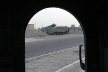 Corporal Leon M. Howard, a Nancy, Ky., native pulls a casualty through the collapsed structure trainer at the Raymond M. Downey Sr. Training Facility located in Indian Head, Md., August 25.  The Marine, who serves with the Chemical Biological Incident Response Force, must overcome several challenges while negotiating the confined space within the trainer.  In addition to operating in small spaces, the students who go through the trainer must properly package the casualties they are extracting in low-light conditions.