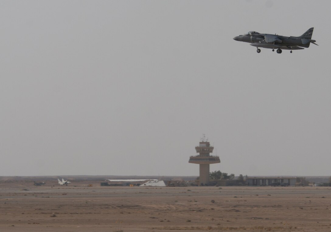 AL ASAD, Iraq ? An AV-8B Harrier of Marine Attack Squadron 223 lands aboard Al Asad air base Aug. 26. The Bulldog?s maintenance crew began preparing the aircraft for the next day when they began flying combat missions.