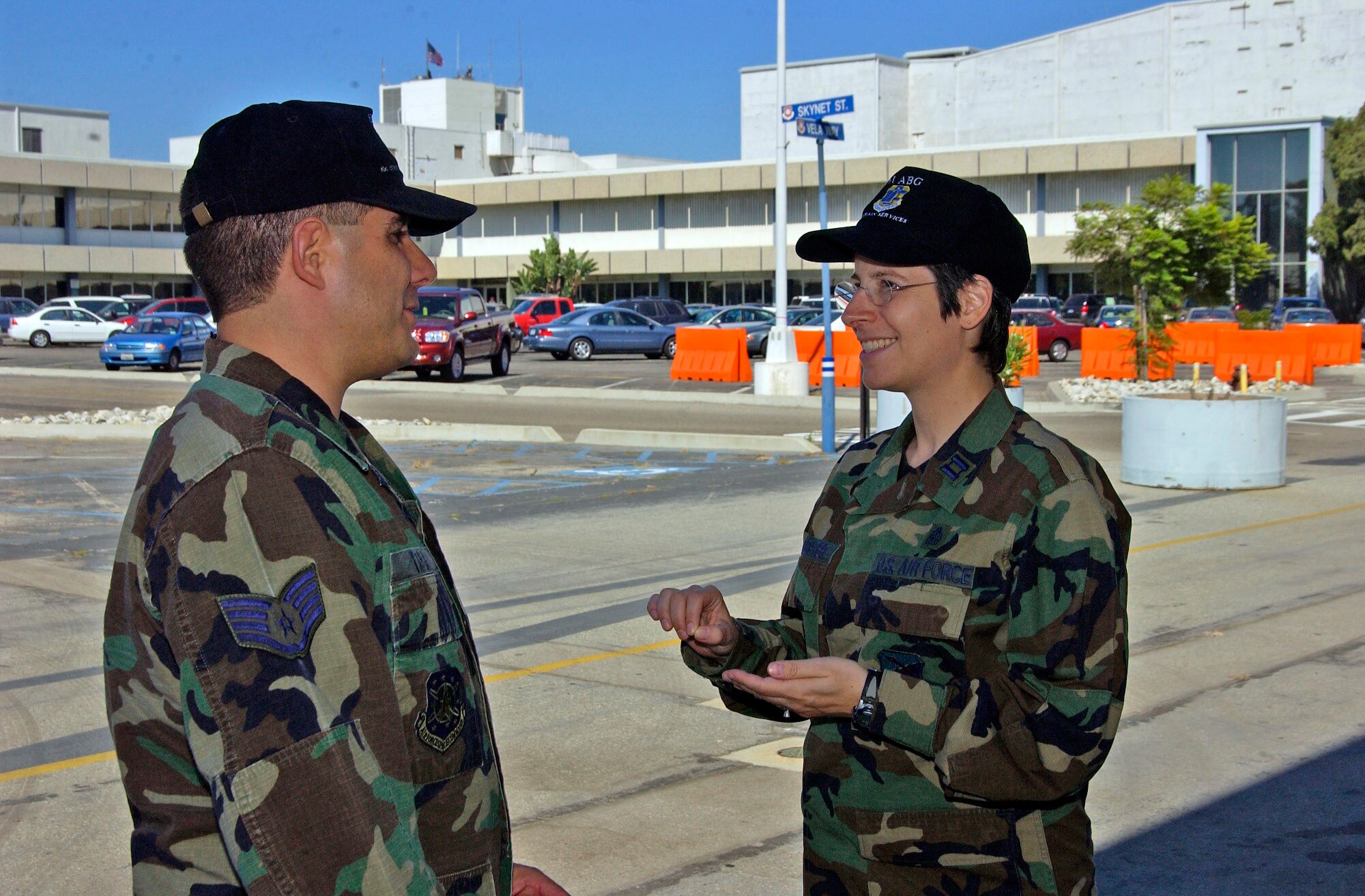 LOS ANGELES AIR FORCE BASE, Calif. -- Staff Sgt. Carlos Tapia speaks with Chaplain (Capt.) Sarah Schechter here.  Chaplain Schechter is a 61st Air Base Group chaplain and the first female rabbi in the Air Force.  Sergeant Tapia is assigned to the 61st Communications Squadron.  (U.S. Air Force photo by Joe Juarez)             