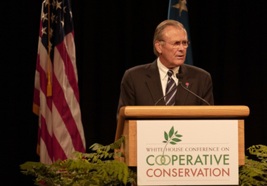 Secretary of Defense Donald H. Rumsfeld addresses the audience at the 4th Annual White House Conference on Cooperative Conservation at the St. Louis, Missouri Convention Center on Aug. 29, 2005. The three-day conference is bringing together more than 1,200 leaders from federal, state, local and tribal government, industry, academia, nonprofit environmental organizations and private landowners. President Bush convened the conference to provide a forum for leaders to exchange information and to identify innovative and effective approaches to promoting cooperative conservation. 