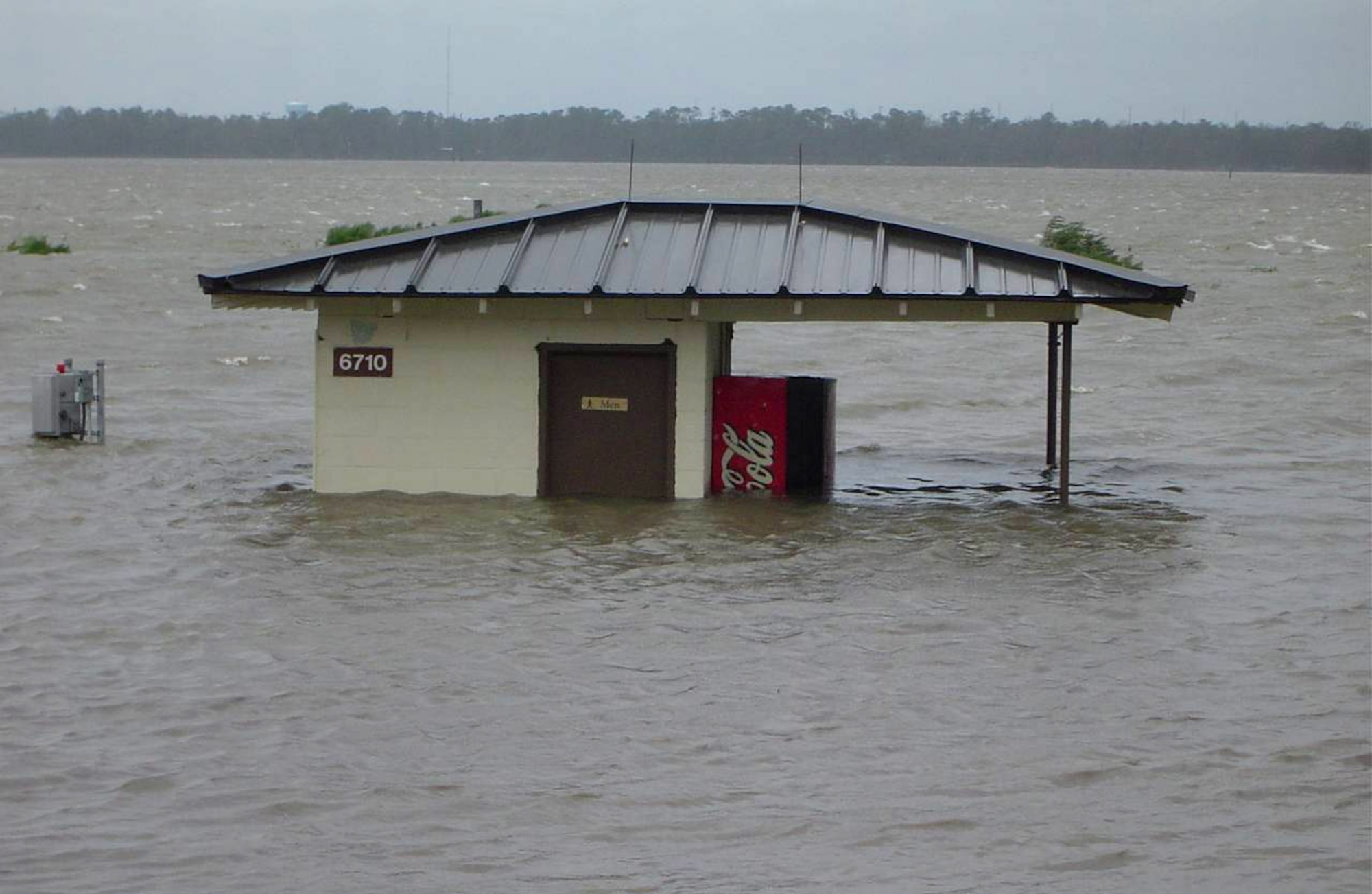 KEESLER AIR FORCE BASE, Miss. -- Record low pressure, 125 mph winds and high tides converged to create a storm surge that raised the level of the Back Bay nearly 30 feet above normal.  This restroom lies between the 12th and 13th holes on back nine of the golf course here.  (U.S. Air Force photo)