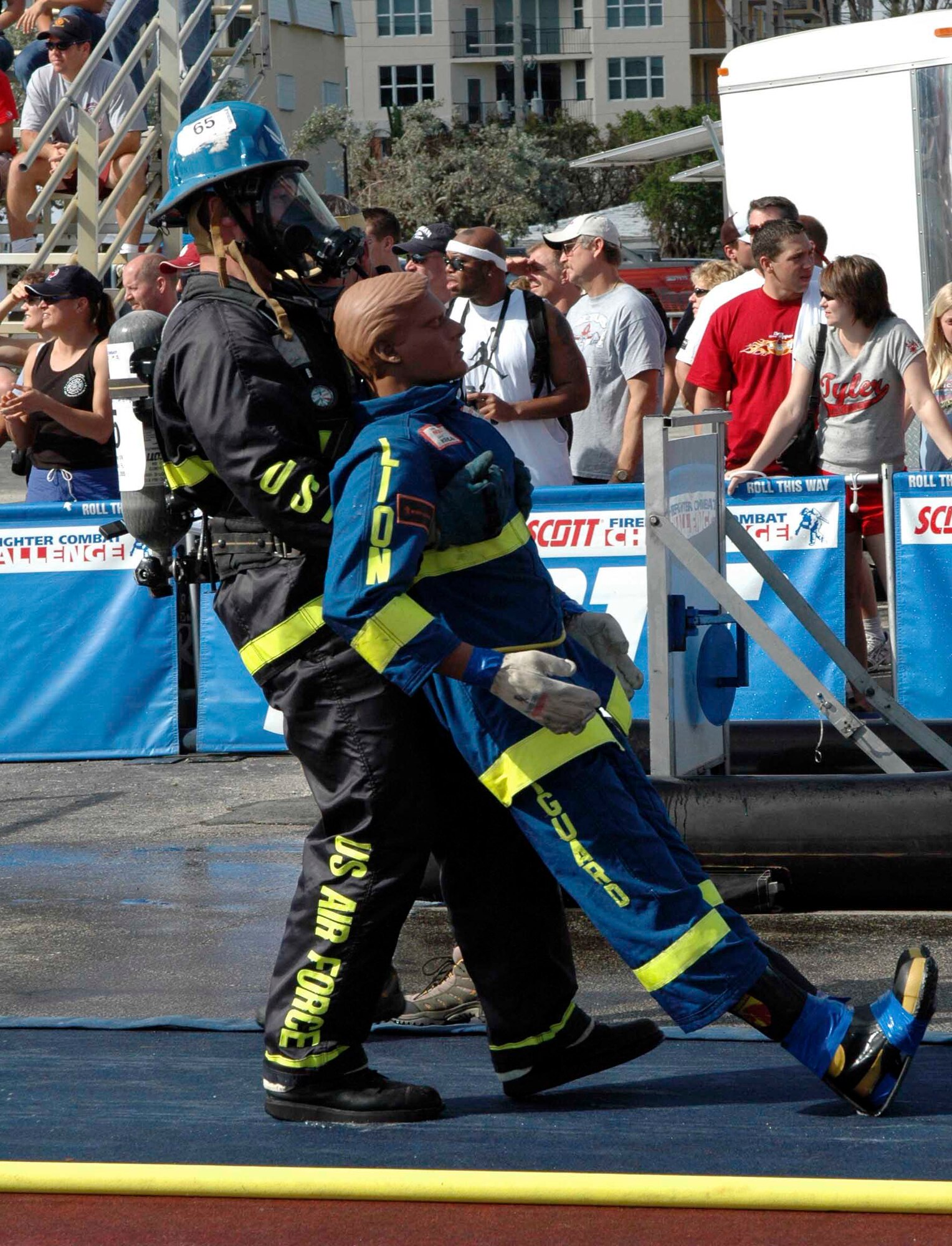DEERFIELD BEACH, Fla. (AFPN) -- Staff Sgt. Harry Myers competes in the victim rescue on the second day of the World Firefighter Combat Challenge. The team of firefighters from Travis Air Force Base, Calif., is trying to retain its title as world champions. Sergeant Myers is a firefighter assigned to the 60th Civil Engineer Squadron. (U.S. Air Force photo by Staff Sgt. Matthew McGovern)