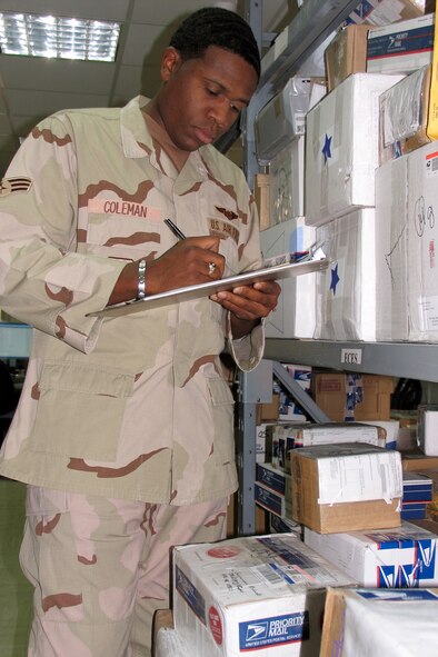 SOUTHWEST ASIA (AFPN) -- Senior Airman Donnell Coleman tracks a new shipment of controlled mail at an air base in Southwest Asia. Airman Coleman is a postal augmentee with the 386th Logistics Readiness Squadron. (U.S. Air Force photo by Tech. Sgt. Mark Getsy)