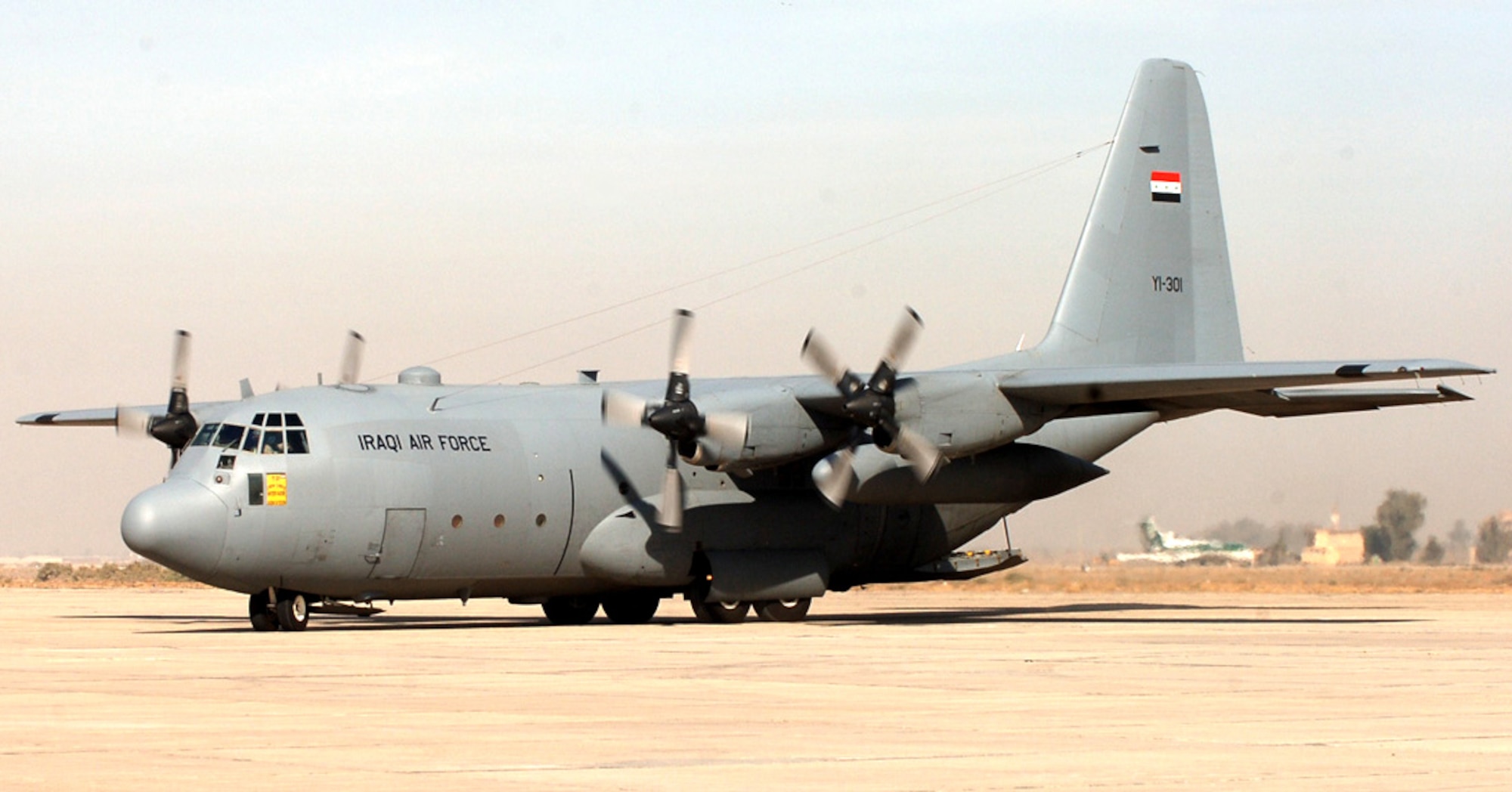 BAGHDAD, Iraq (AFPN) -- An Iraqi C-130 Hercules arrives here at New Al Muthana. It was the first mission flown by an all Iraqi aircrew. (U.S. Air Force photo by Master Sgt. Randy L. Mitchell)