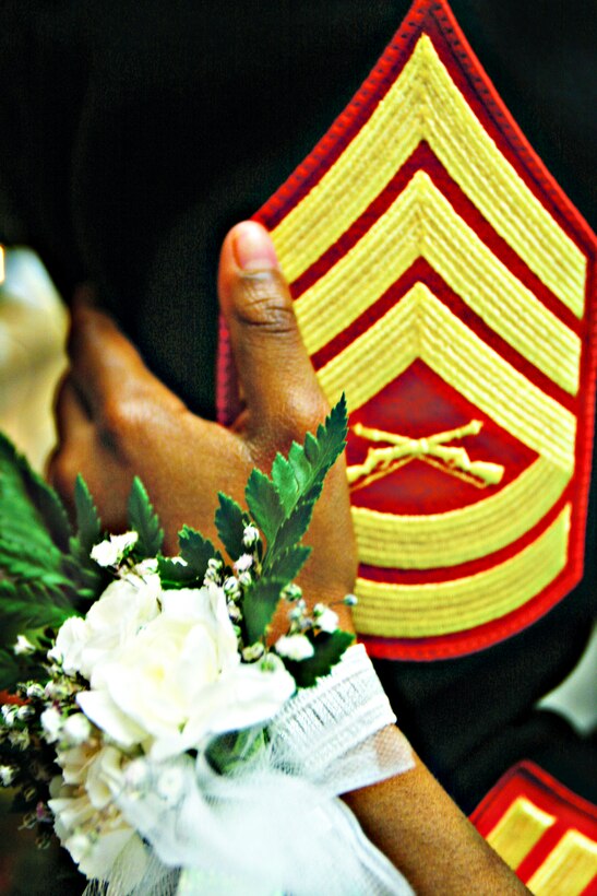 More than 200 Marines escorted their daughters to Mary Fay Pendleton Elementary School for the school's Father-Daughter Dance Dec. 2. The night ended with a slow dance where some daughters embraced their fathers for the last time before deployment.