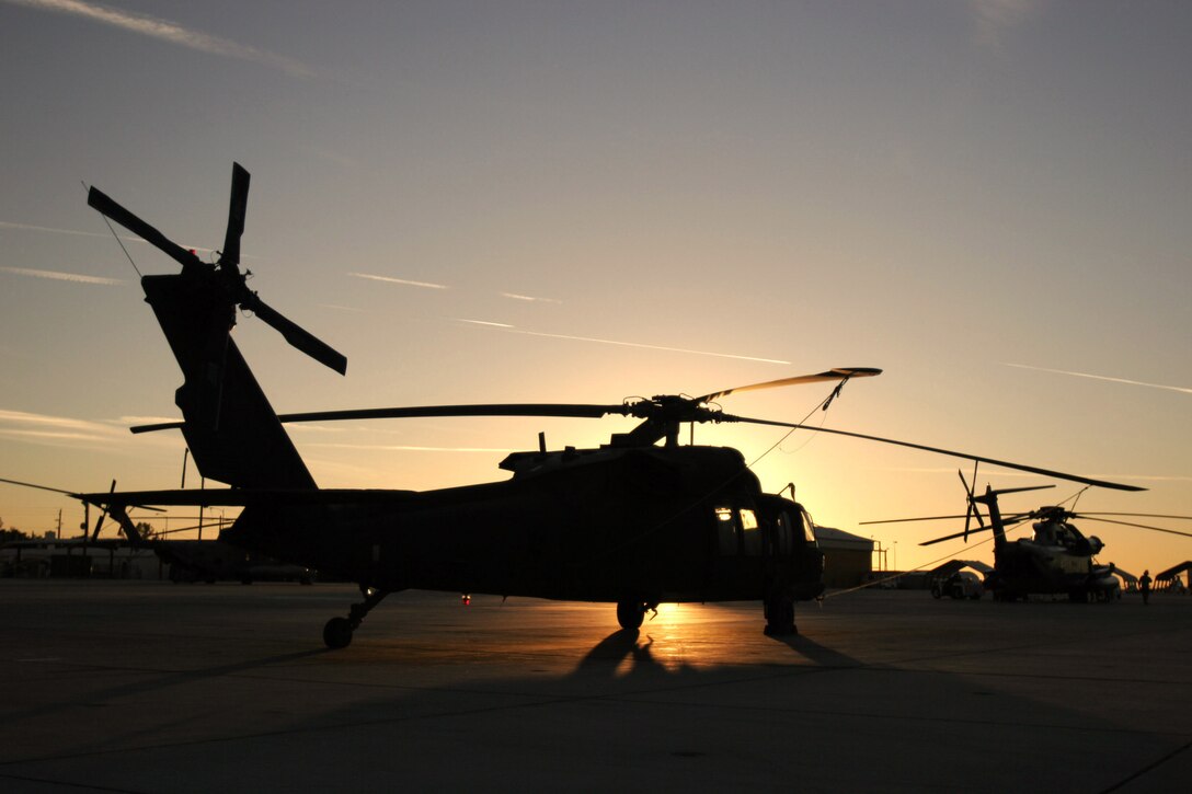 MARINE CORPS AIR STATION YUMA, Ariz. -- A lone  UH-60 Blackhawk helicopter sits on the flightline of Marine Corps Air Station Yuma awaiting the 12 days of training during Exercise Desert Talon. The Blackhawk belongs to the Army's 2nd Battalion 224th Aviation Regiment who's goal at MCAS Yuma is to participate in joint operations and prepare for the upcoming deployment to Iraq. Photo by Lance Cpl. Brandon L. Roach