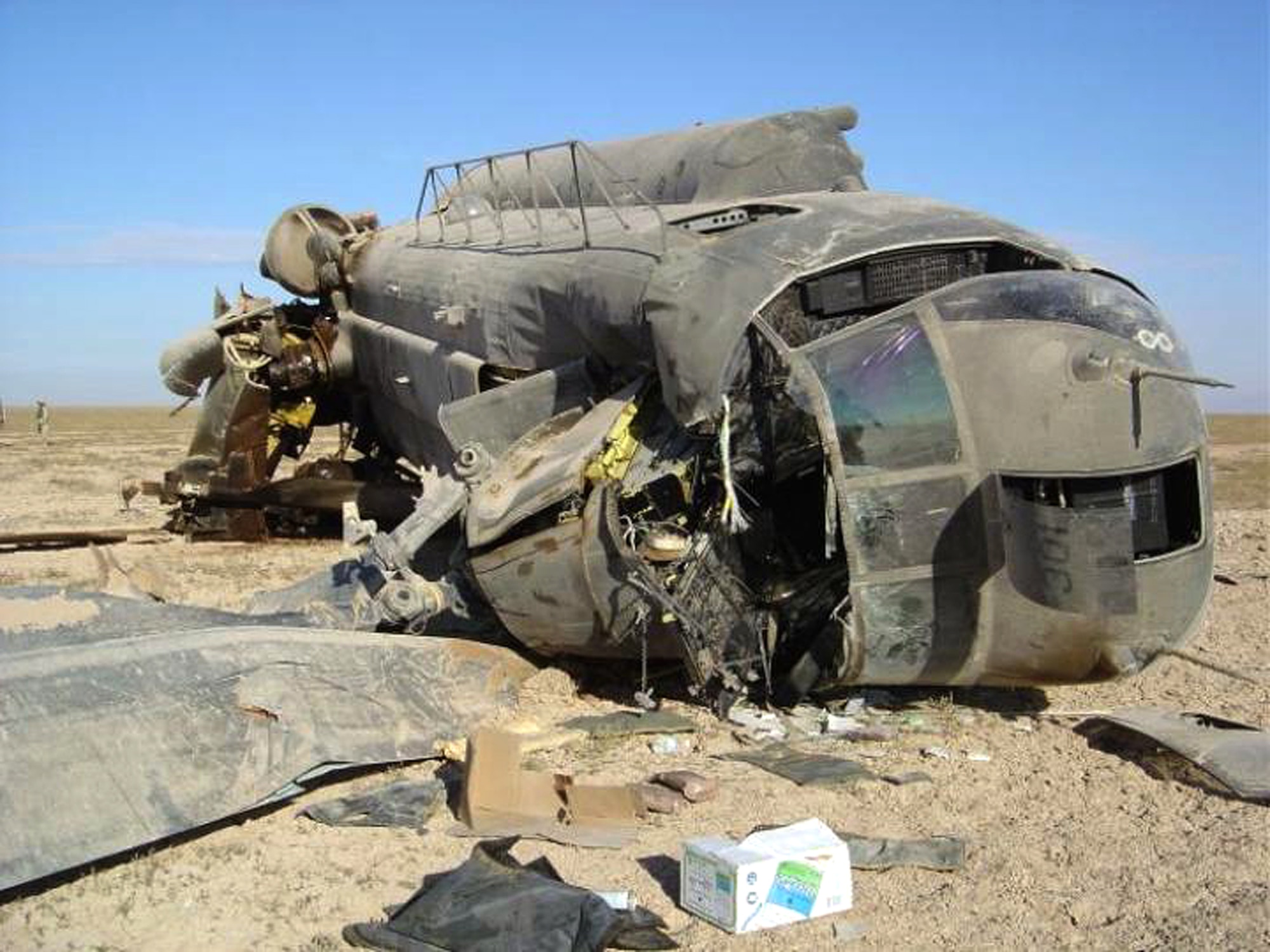 IRAQ (AFPN) -- The wreckage of the Army CH-47 Chinook helicopter lies in the Iraqi desert. Airmen rescued its five crewmembers on April 16, 2004. (U.S. Air Force photo)