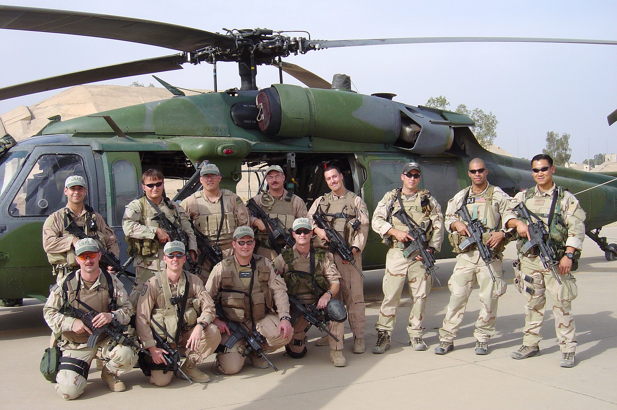 BALAD AIR BASE, Iraq (AFPN) -- The crew members of Jolly 11 and Jolly 12: (Top row, from left) then-Capt. Joseph Galletti, Staff Sgt. Vincent J. Eckert, then-Tech. Sgt. Paul Silver, Tech. Sgt. Thomas Ringheimer, then-1st Lt. Gregory Rockwood, Staff Sgt. Michael Rubio, Staff Sgt. John Griffin and Staff Sgt. Edward Ha. (Bottom row: from left) Staff Sgt. Patrick Ledbetter, Capt. Bryan Creel, Capt. Robby Wrinkle and Tech. Sgt. Michael Preston. Not shown is Staff Sgt. Matthew Leigh. (U.S. Air Force photo by Staff Sgt. Prentice Colter)