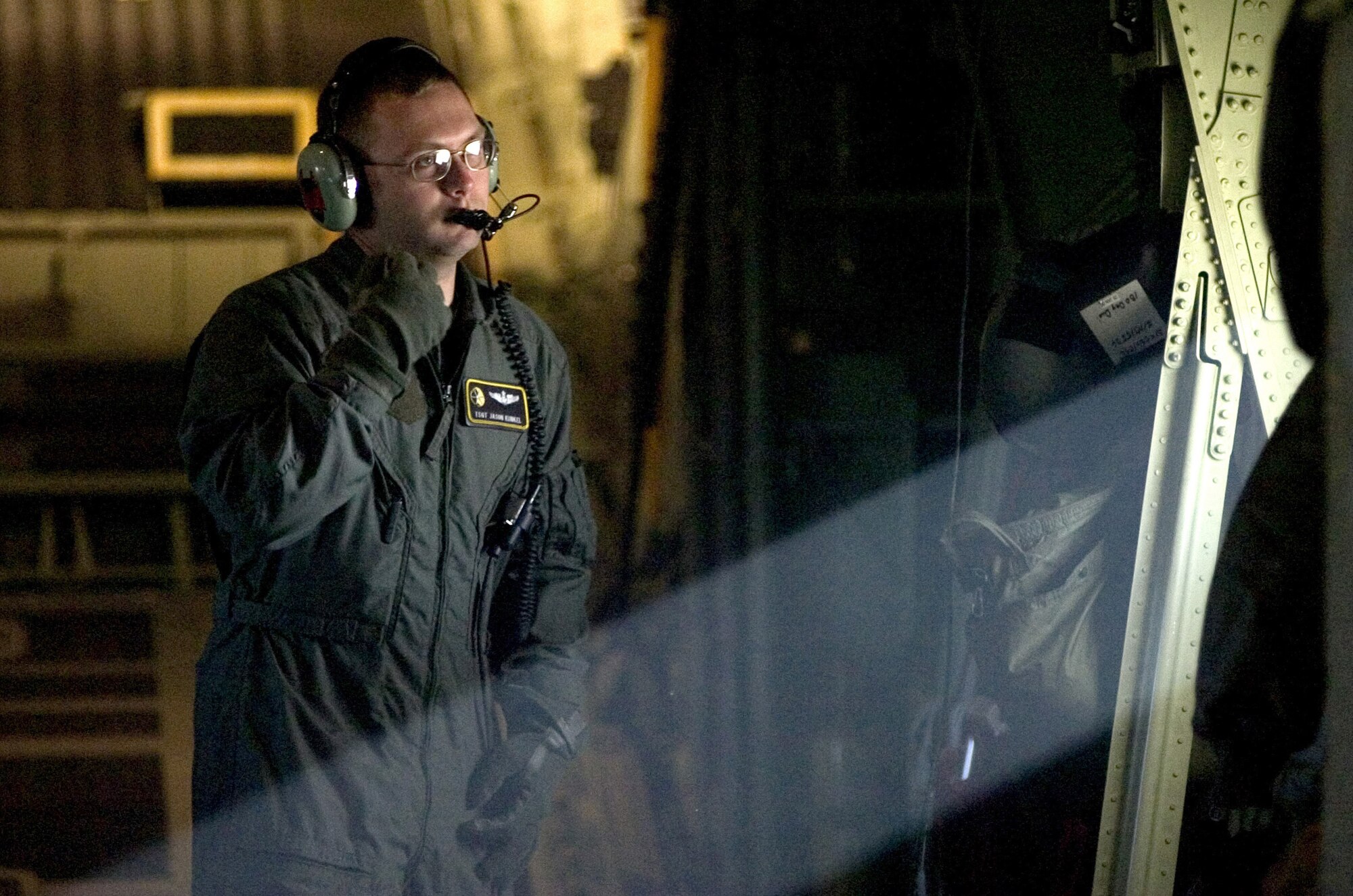 LITTLE ROCK AIR FORCE BASE, Ark. (AFPN) -- Tech Sgt. Jason Kunkel pauses during a preflight inspection. Sergeant Kunkel conducted troop and equipment onload and offload operations as well as a combat delivery system airdrops during a Joint Readiness Training Center exercise. Sergeant Kunkel is a loadmaster with the 48th Airlift Squadron. (U.S. Air Force photo by Tech. Sgt. Christopher Steffen)