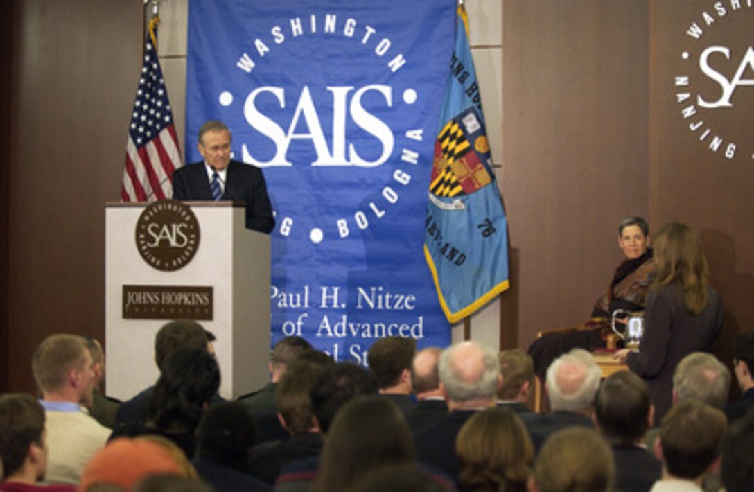 Secretary of Defense Donald H. Rumsfeld listens to a question from the audience after his speech at the School of Advanced International Studies at John Hopkins University in Washington, D.C., on Dec. 5, 2005. Rumsfeld addressed the students and faculty of the school about the future of Iraq. 