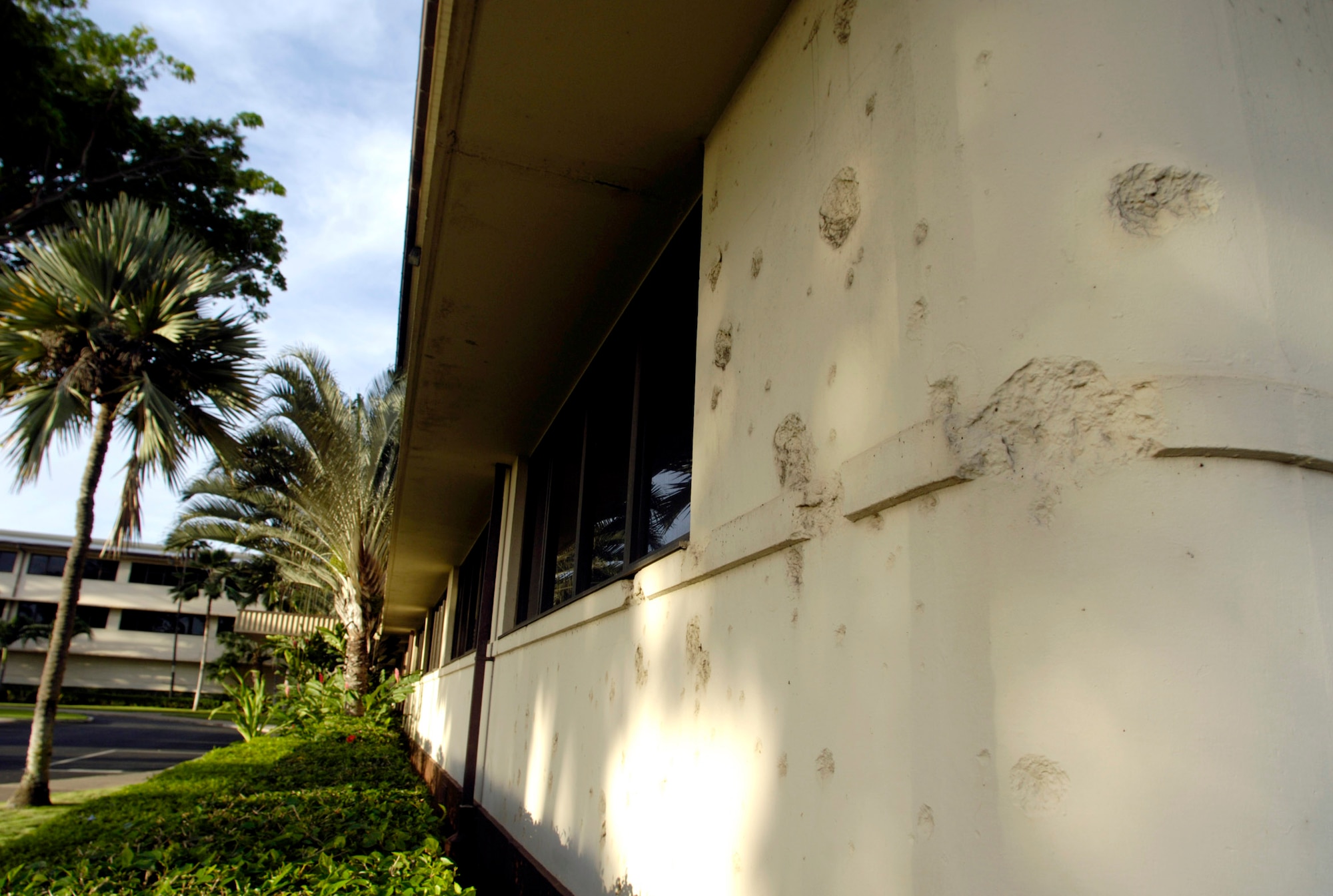 HICKAM AIR FORCE BASE, Hawaii (AFPN) -- Bullet and shrapnel holes still scar the outside of the Pacific Air Forces headquarters building here. The scars are a constant reminder of the Dec. 7, 1941, surprise Japanese attack on military installations on the Hawaiian island of Oahu. (U.S. Air Force photo by Tech. Sgt. Shane A. Cuomo)