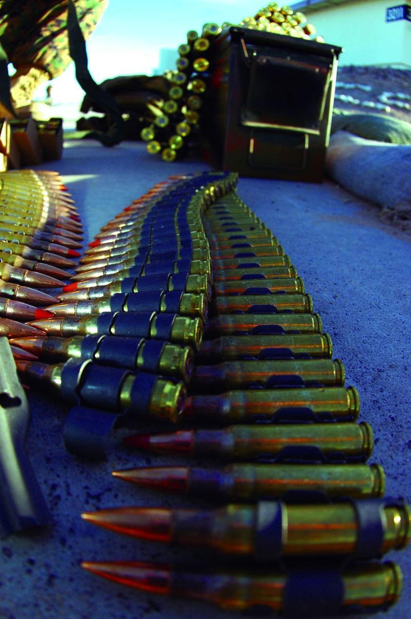 Links of 7.62 mm ammunition are laid out in preparation for distribution to Marine Air Control Squadron 1 Marines during a live fire convoy security exercise at the Barry M. Goldwater range located approximately 12 miles south of the air station Dec. 7. Ammunition varied from 5.56 mm to .50-caliber rounds.