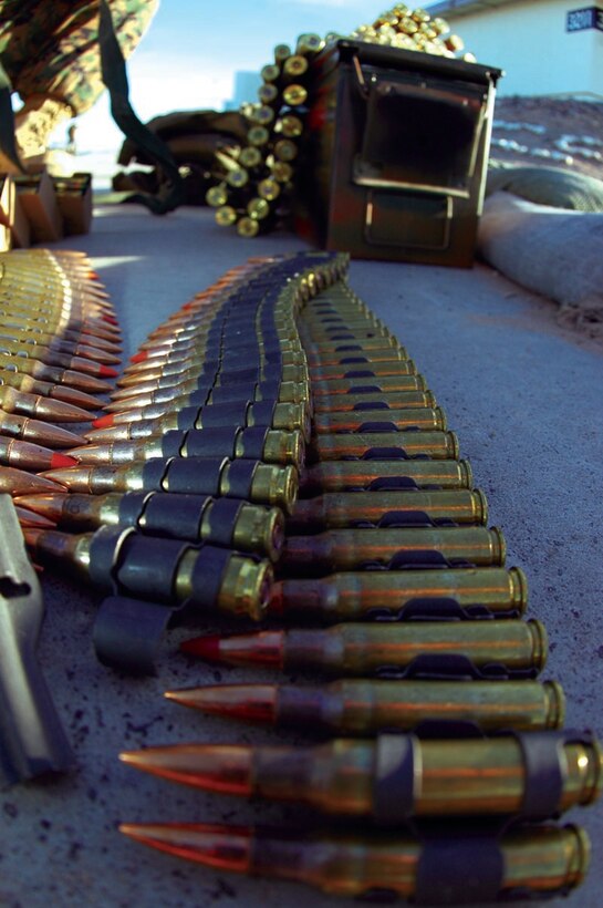 Links of 7.62 mm ammunition are laid out in preparation for distribution to Marine Air Control Squadron 1 Marines during a live fire convoy security exercise at the Barry M. Goldwater range located approximately 12 miles south of the air station Dec. 7. Ammunition varied from 5.56 mm to .50-caliber rounds.