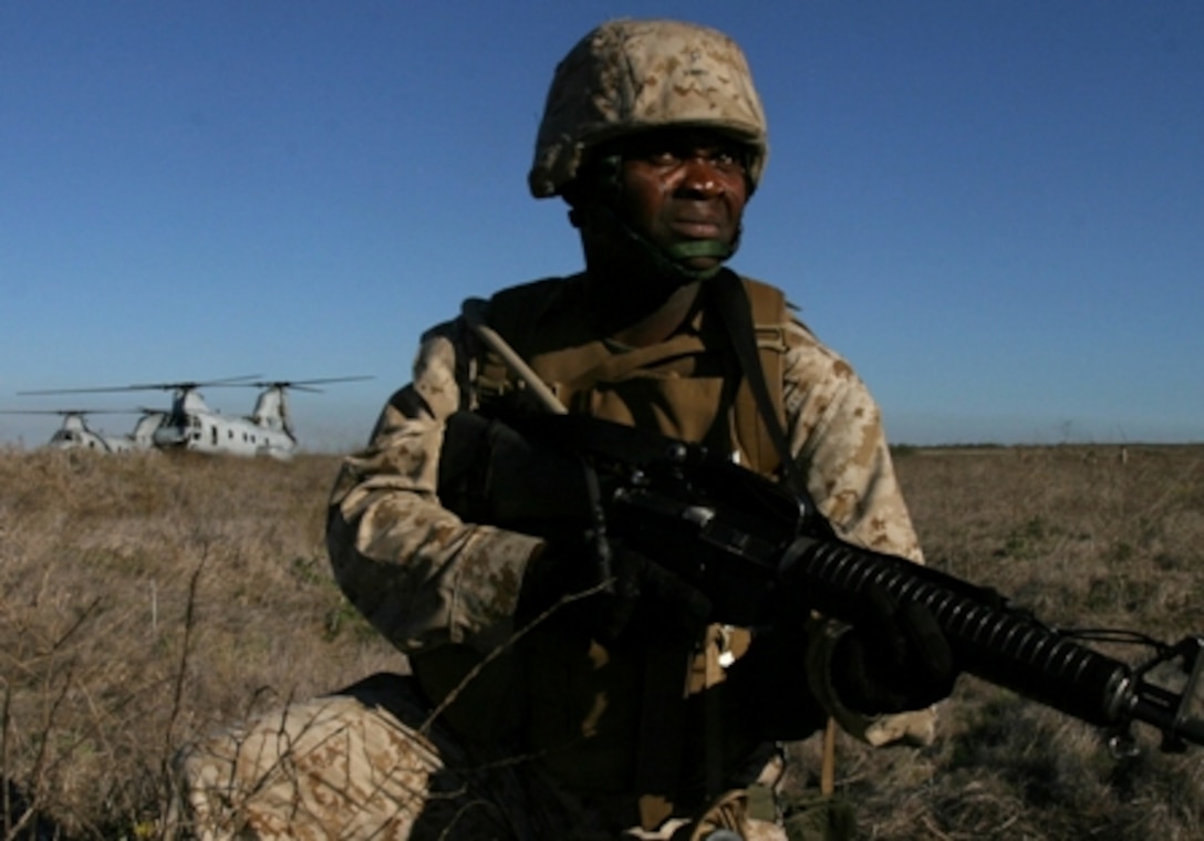 ABOARD THE U.S.S. PELELIU (Dec, 7, 2005) -Cpl. Mambasse Patara provides security while the rest of the Marines and sailors from the 11th Marine Expeditionary Unit conducted an enhanced nuclear, biological and chemical operation and mass casualty exercise on San Clemente Island.  Marines and sailors from the command element, Battalion Landing Team, 1st Battalion 4th Marines and MEU Service Support Group 11 where transported in CH-53s and CH-46s from Marine Medium Helicopter squadron 166 (Rein) to the training site.  The Marines and sailors of BLT 1-4, MSSG 11, both from Camp Pendleton, HMM 166, Marine Corps Air Station Miramar, San Diego, along with Amphibious Squadron 3 and Expeditionary Strike Group 3, are conducting training exercises as part of their pre-deployment training aboard the Peleliu, Camp Pendleton and at San Clemente in preparation for their upcoming deployment early next year. (Official USMC photo by: GySgt. Robert K. Blankenship For public release