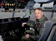 Lt. Gen. John A. Bradley, commander of Air Force Reserve Command, sits in in the cockpit before takeoff in a new C-130J Hercules Monday from the Lockheed-Martin facility in Marietta, Ga.  General Bradley helped ferry the Herc from Marietta to the 403rd Wing at Keesler Air Force Base, Miss.  The flight took about one hour. 