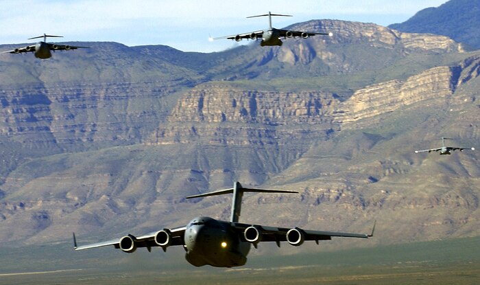 OVER TEXAS (AFPN) -- C-17 Globemaster IIIs fly in a formation.  The flight from Charleston Air Force Base, S.C. to Biggs Army Air Field, Texas was the largest C-17 formation ever to fly across the country. (U.S. Air Force photo by Staff Sgt. Matthew Hannen)