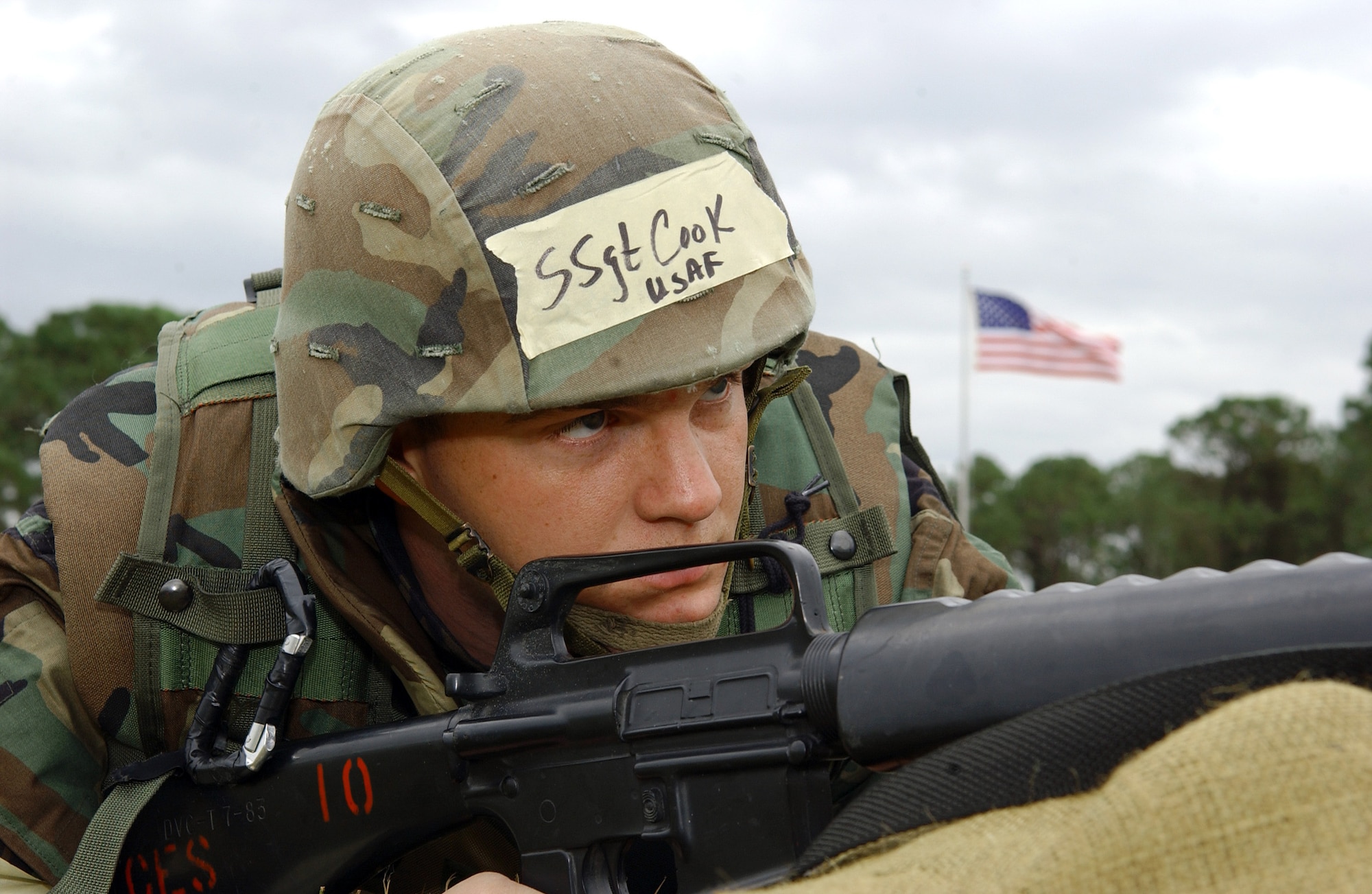 MACDILL AIR FORCE BASE, Fla. (AFPN) -- Staff Sgt. Joseph Cook guards his defensive fighting position during an ability to survive and operate exercise here. The exercise, held Dec. 7, trains Airman to survive and accomplish their mission under adverse combat conditions. Sergeant Cook is a security forces troop with the 6th Security Forces Squadron here. (U.S. Air Force photo by Airman 1st Class Bradley A. Lail)