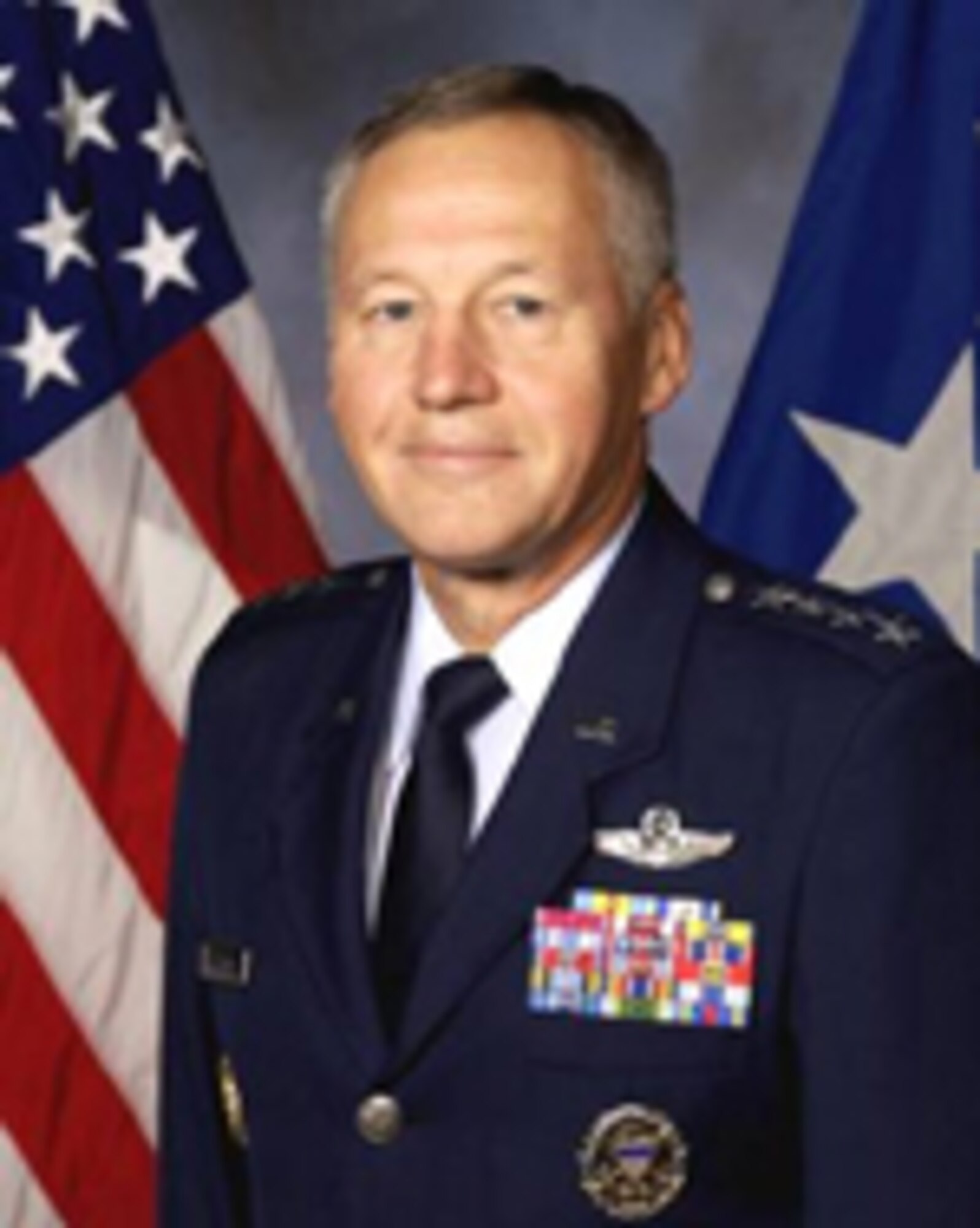 WRIGHT-PATTERSON AIR FORCE BASE, Ohio (AFMCNS) - Gen. Bruce Carlson reminds the AFMC work force to take care of itself and others during the holiday season. (Air Force photos)