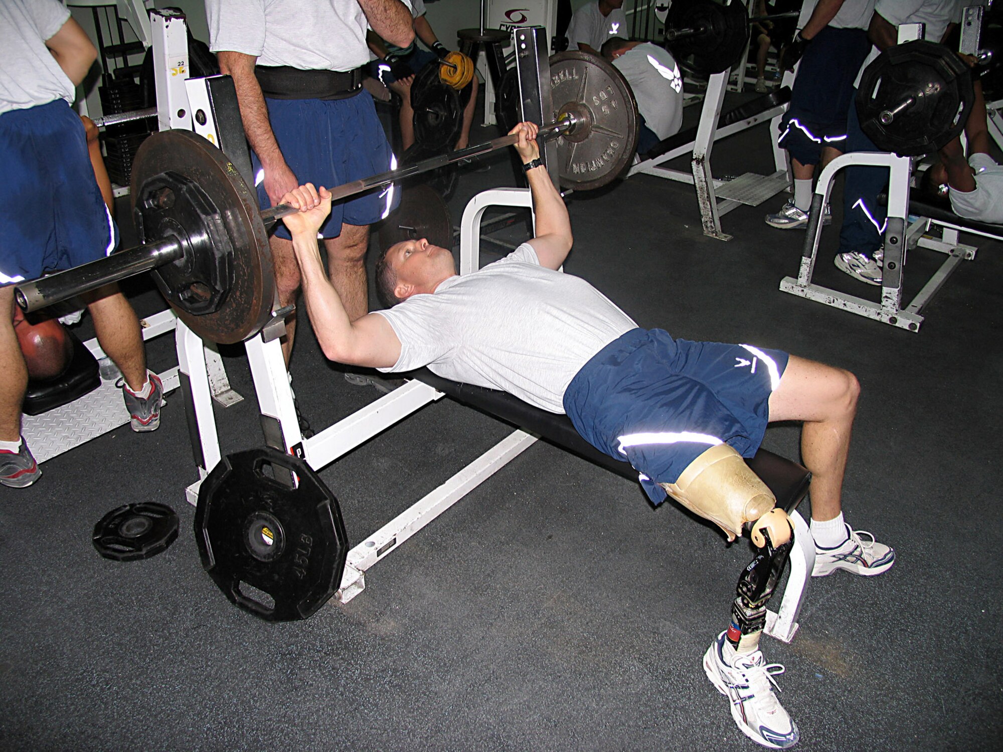 SOUTHWEST ASIA (AFPN) -- Maj. Alan Brown does some bench presses at the gym. He is scheduled to attend pilot re-qualification training. He lost his leg more than seven years ago during a hunting accident. (U.S. Air Force photo by Tech. Sgt. Mark Getsy)