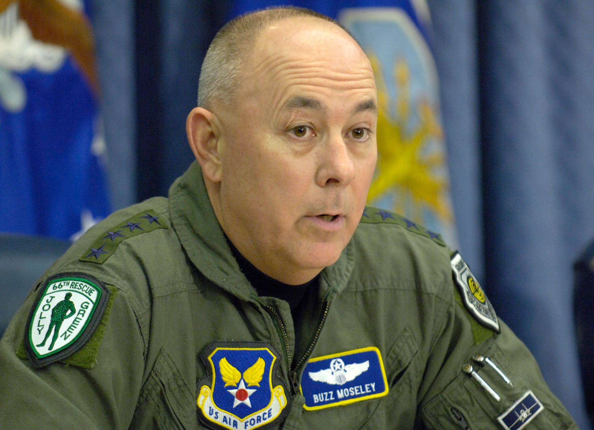 WASHINGTON (AFPN) -- Chief of Staff of the Air Force Gen. T. Michael Moseley answers a reporter's questions during a media round table discussion at the Pentagon Dec. 13. (U.S. Air Force photo by Master Sgt. Jim Varhegyi)