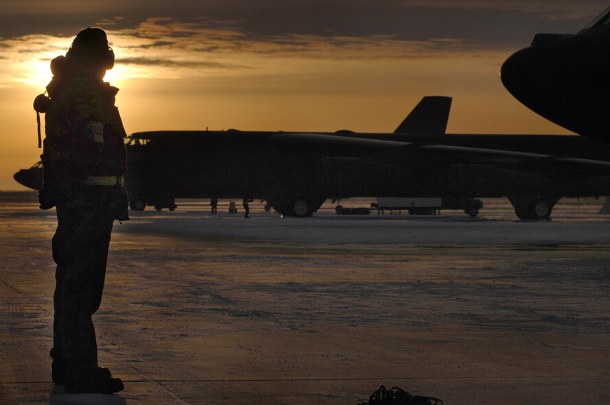 MINOT AIR FORCE BASE, N.D. (AFPN) -- Staff Sgt. Christopher Oliva waits to launch a B-52H Stratofortress here.  Nine bombers participated in a rapid launch exercise testing the base's ability to respond quickly to national directives. Sergeant Oliva is with the 5th Aircraft Maintenance Squadron.  (U.S. Air Force photo by Staff Sgt. Jocelyn Rich)