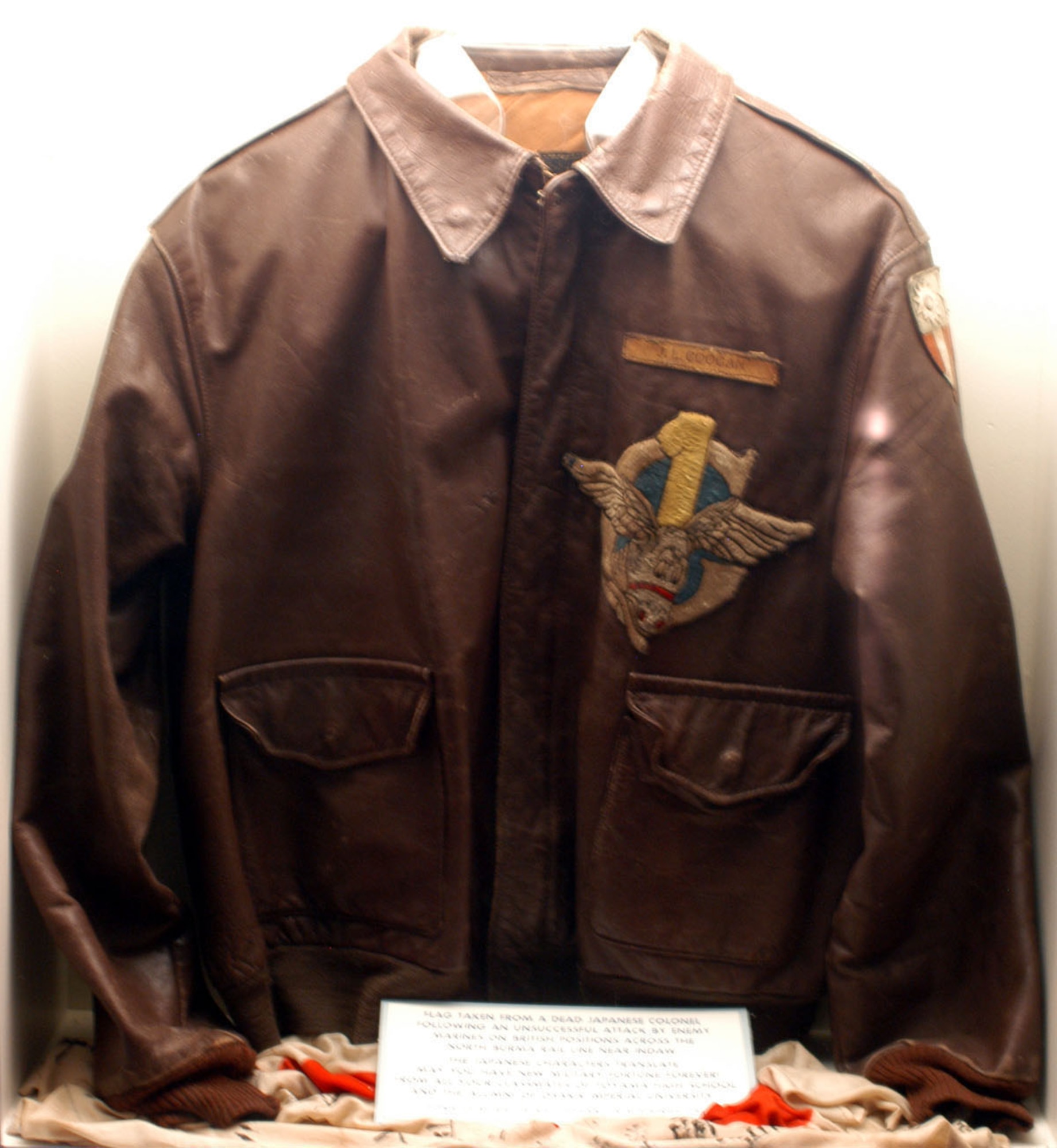 DAYTON, Ohio -- Flight Officer Jackie Coogan's  jacket is on display with the Celebrities in Uniform exhibit in the World War II Gallery at the National Museum of the United States Air Force. (U.S. Air Force photo)