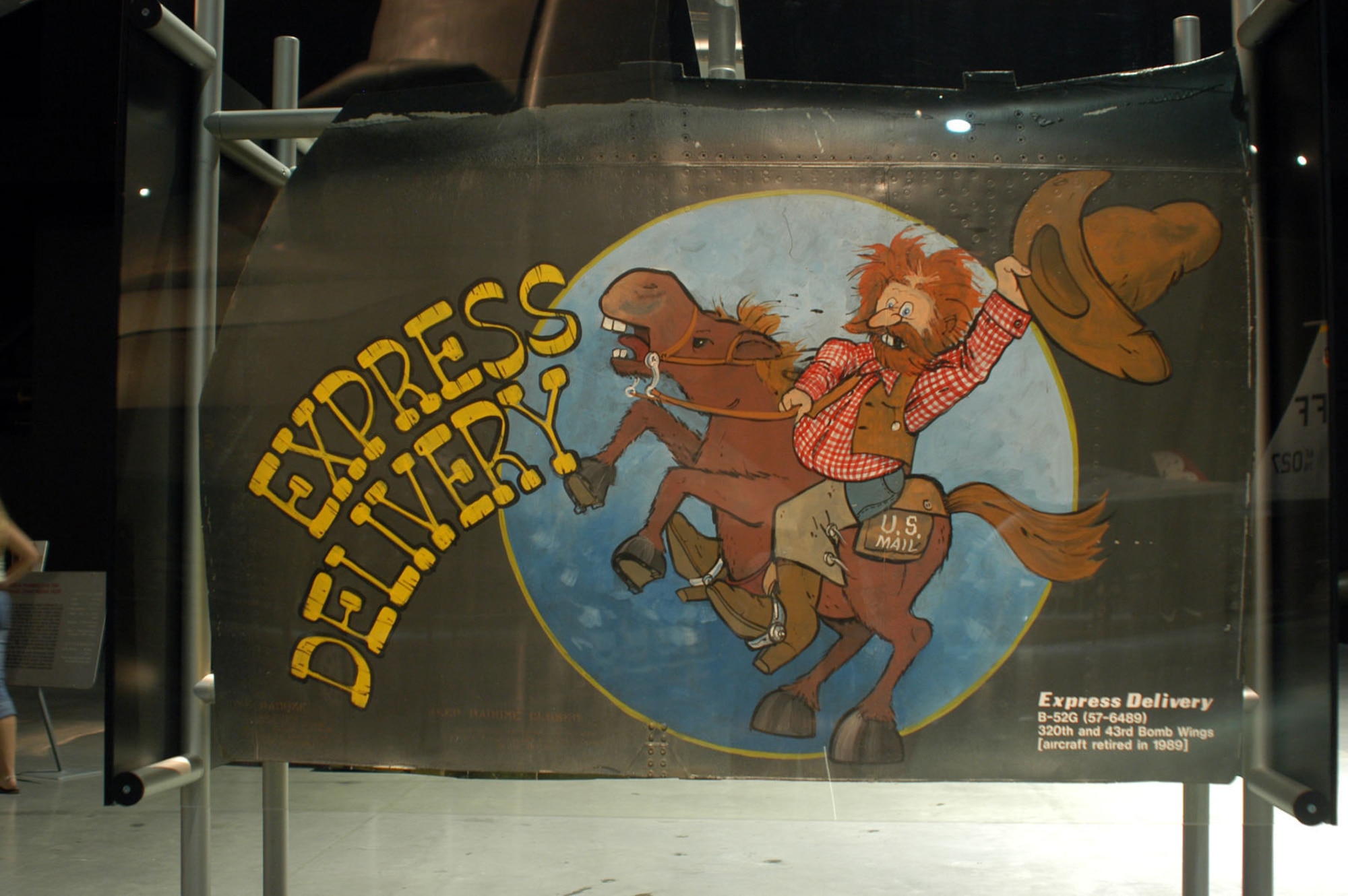 DAYTON, Ohio -- "Express Delivery" nose art from a Boeing B-52G on display in the Cold War Gallery at the National Museum of the United States Air Force. (U.S. Air Force photo)