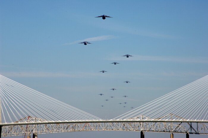 CHARLESTON, S.C. (AFPN) -- A formation of 17 C-17 Globemaster IIIs assigned to the 437th and 315th Airlift Wings at Charleston Air Force Base fly in formation.  The flight, which demonstrates the U.S. Air Force's strategic capability, is the largest formation of C-17s to take flight from a single base.  (U.S. Air Force photo by Tech. Sgt. Richard T. Kaminsky)
