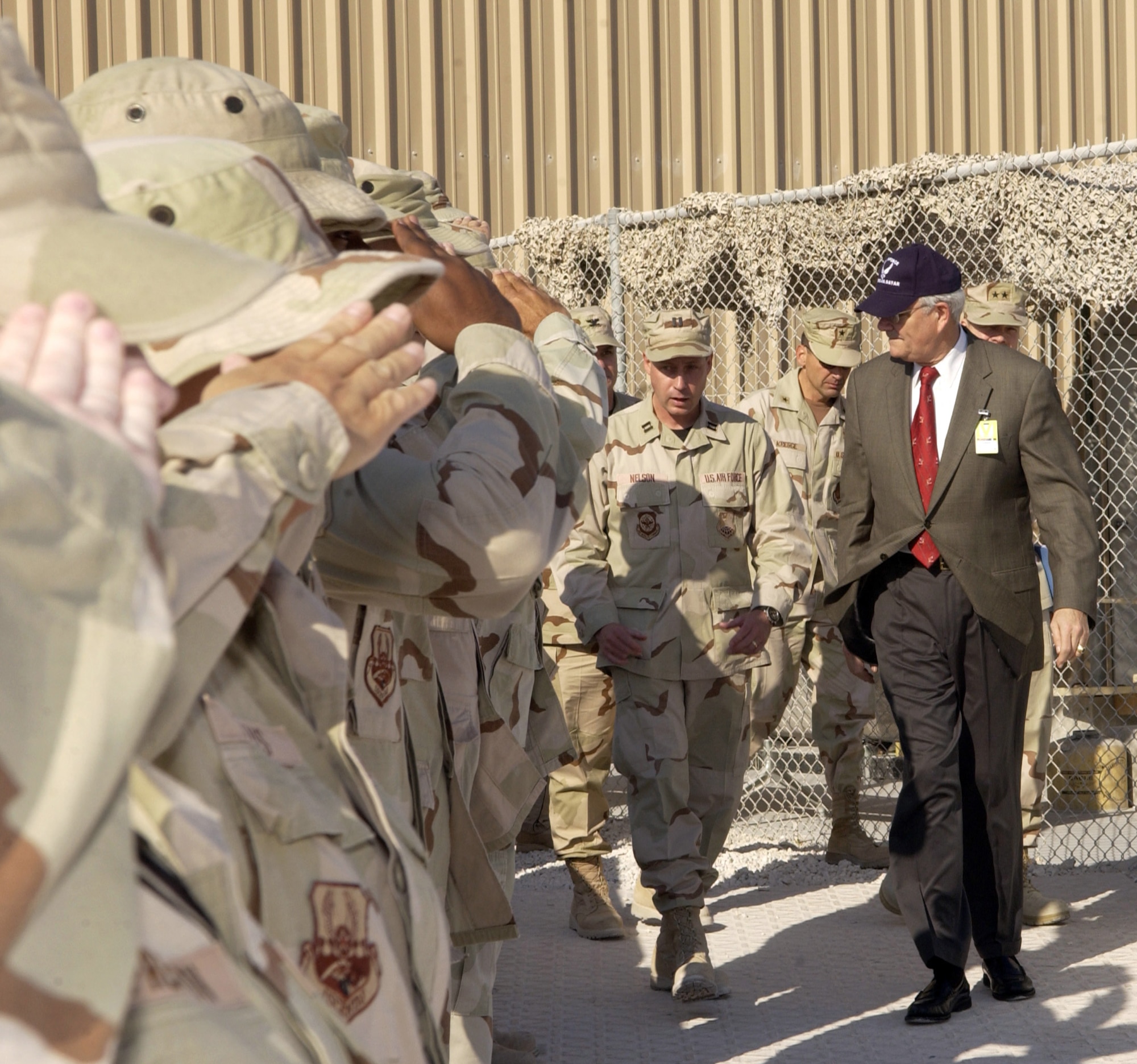 SOUTHWEST ASIA (AFPN) -- Secretary of the Air Force Michael W. Wynne meets a group Airmen with the 379th Air Expeditionary Wing.  This is Secretary Wynne's first tour to the region. (U.S. Air Force photo by Staff Sgt. Rhiannon Willard) 