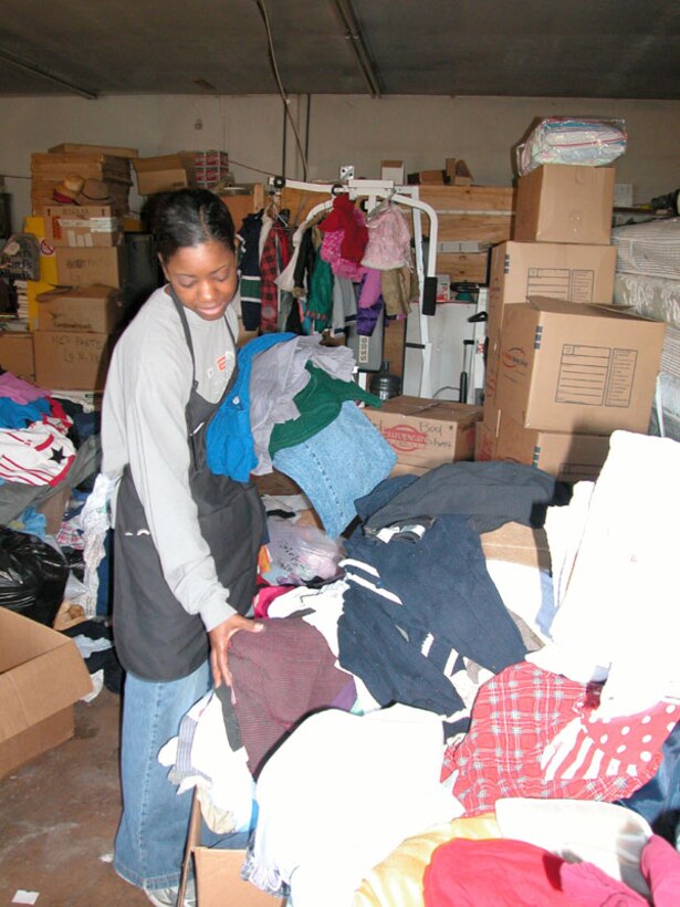 Takesha Williams, master sergeant and first sergeant for the 507th Air Refueling Wing's Operations Group, sorts clothing donated for Katrina evacuees to the Oklahoma City area.  Williams is the president of the Air Force Reserve Enlisted Advisory Council located at Tinker AFB, Okla.