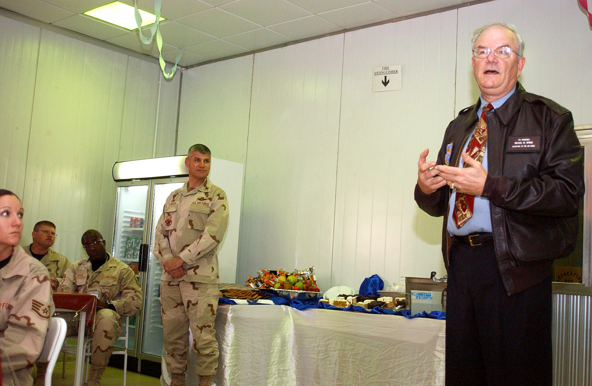 ALI BASE, Iraq -- Secretary of the Air Force Michael W. Wynne passed along holiday greetings and answered several questions from Airmen during a luncheon here Dec. 19. (U.S. Air Force photo by Tech. Sgt. Paul Dean) 

