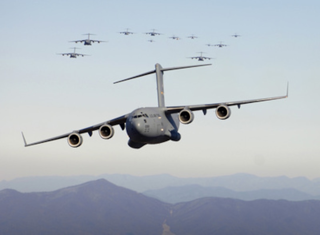 Seventeen C-17 Globemaster III aircraft fly over the Blue Ridge Mountains in Virginia during low level tactical training on Dec. 20, 2005. The C-17s, assigned to the 437th and 315th Airlift Wings at Charleston Air Force Base, S.C., demonstrated the strategic airdrop capability of the U.S. Air Force. 