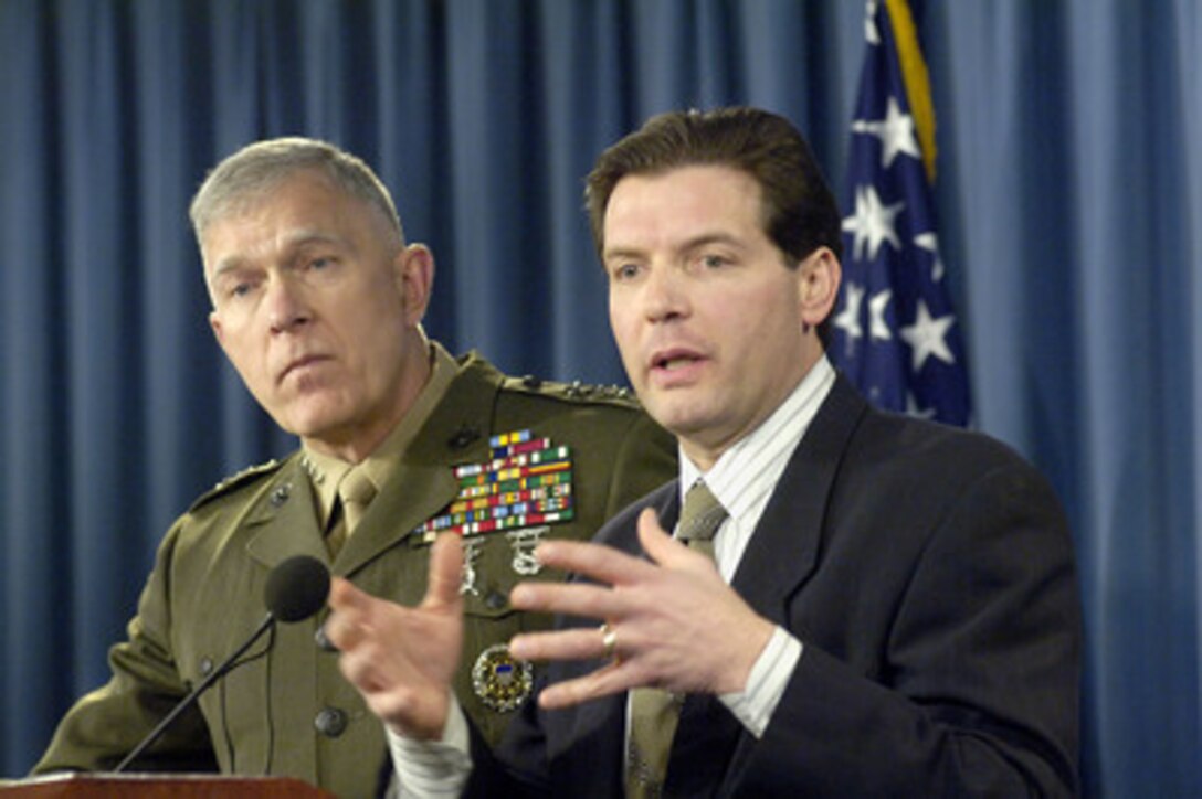 Principal Deputy Assistant Secretary of Defense for Public Affairs Lawrence Di Rita (right) and Lt. Gen. James T. Conway (left), U.S. Marine Corps, field questions from reporters during a Pentagon press briefing on Dec. 22, 2005. 