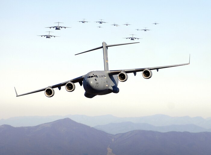 A C-17 Globemaster III takes off from Fort Hunter Liggett, Calif., Sept. 23, 2006, while performing take-off and landing testing on semi-prepared runways. The first of four test phases was conducted at Fort Hunter Liggett to validate the ability of the aircraft to bring a large force into a wet or dry dirt airfield without making runway condition corrections. (Photo by Bobbi Zapka)