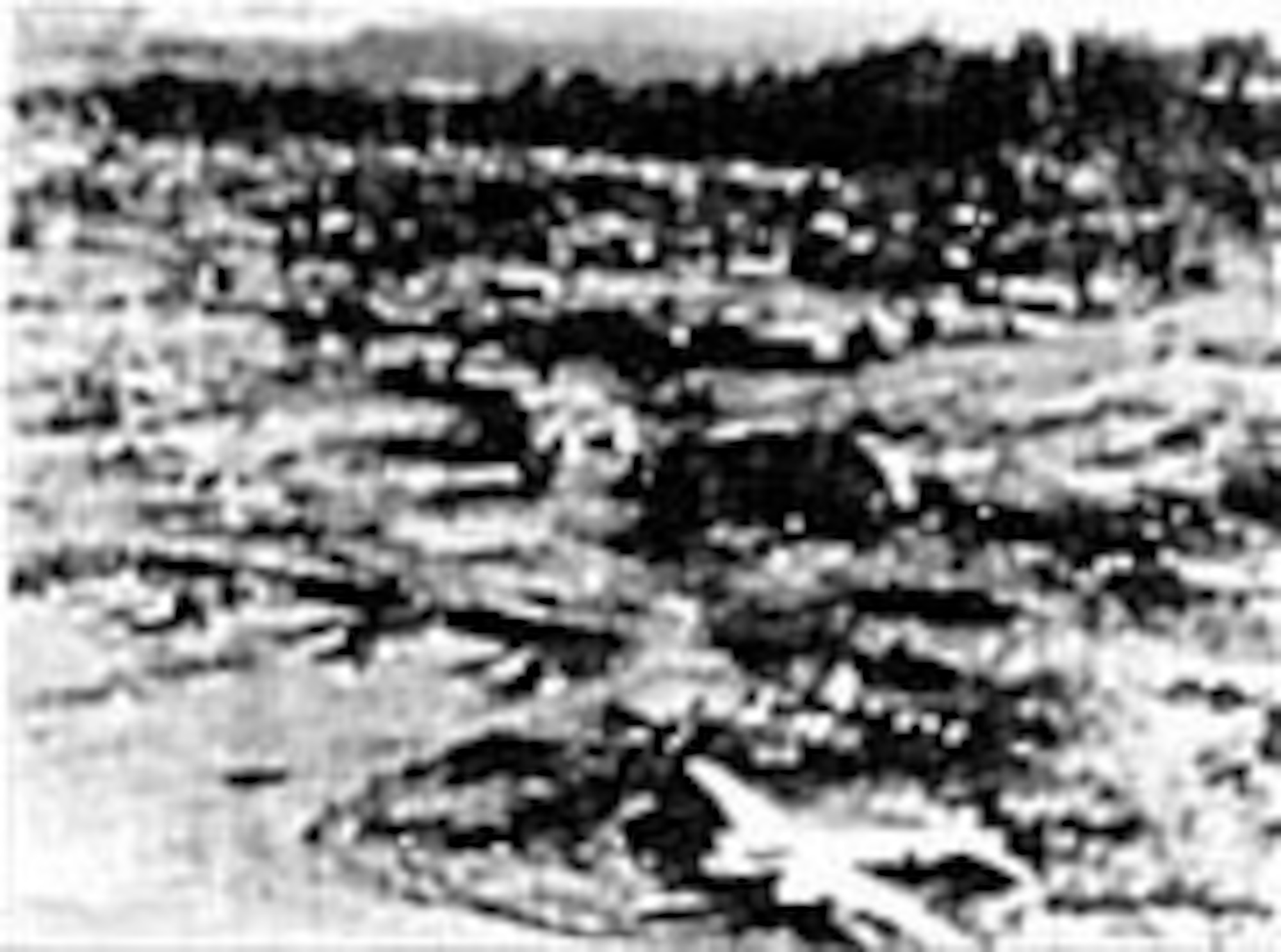 Lae, New Guinea, on Jan. 18, 1943, after Allied planes delivered eight tons of bombs and almost 13,000 rounds of ammunition in a bombing and strafing attack. (U.S. Air Force photo)