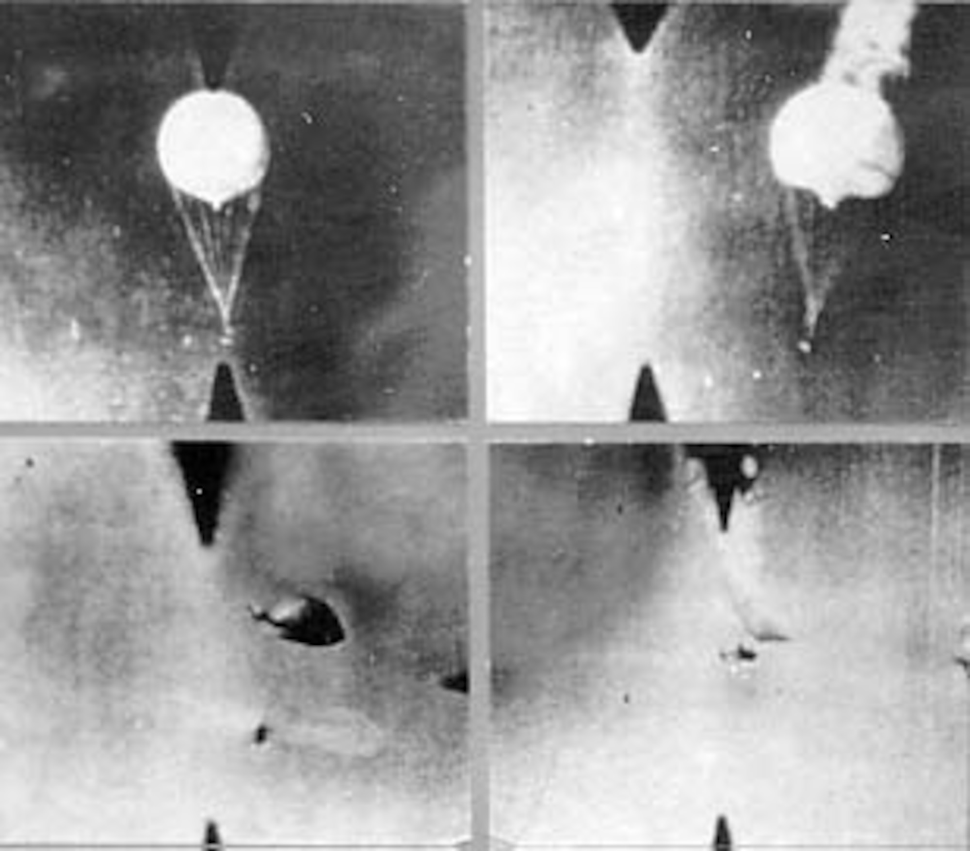This gun camera photograph shows balloons being shot down by 11th Air Force fighters near Attu in the Aleutians on April 11, 1945. Nine balloons were downed in two hours. Note the P-38 in lower right frame. (U.S. Air Force photo)