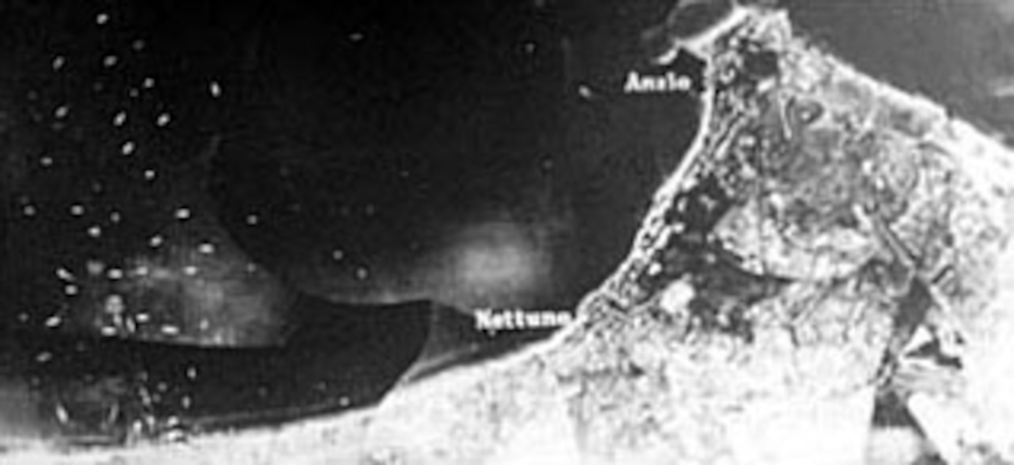 Composite photograph of the Allied landing on the Italian coast at Anzio. The lower left portion was taken while the beach was under attack by German airplanes. (U.S. Air Force photo)