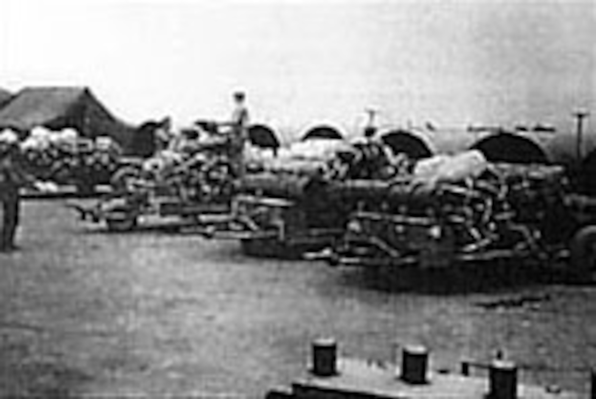 Loads carefully packed onto trailers at Holmewood, England, under tight security were taken to Harrington, where they were loaded onto the aircraft for a mission. (U.S. Air Force photo)