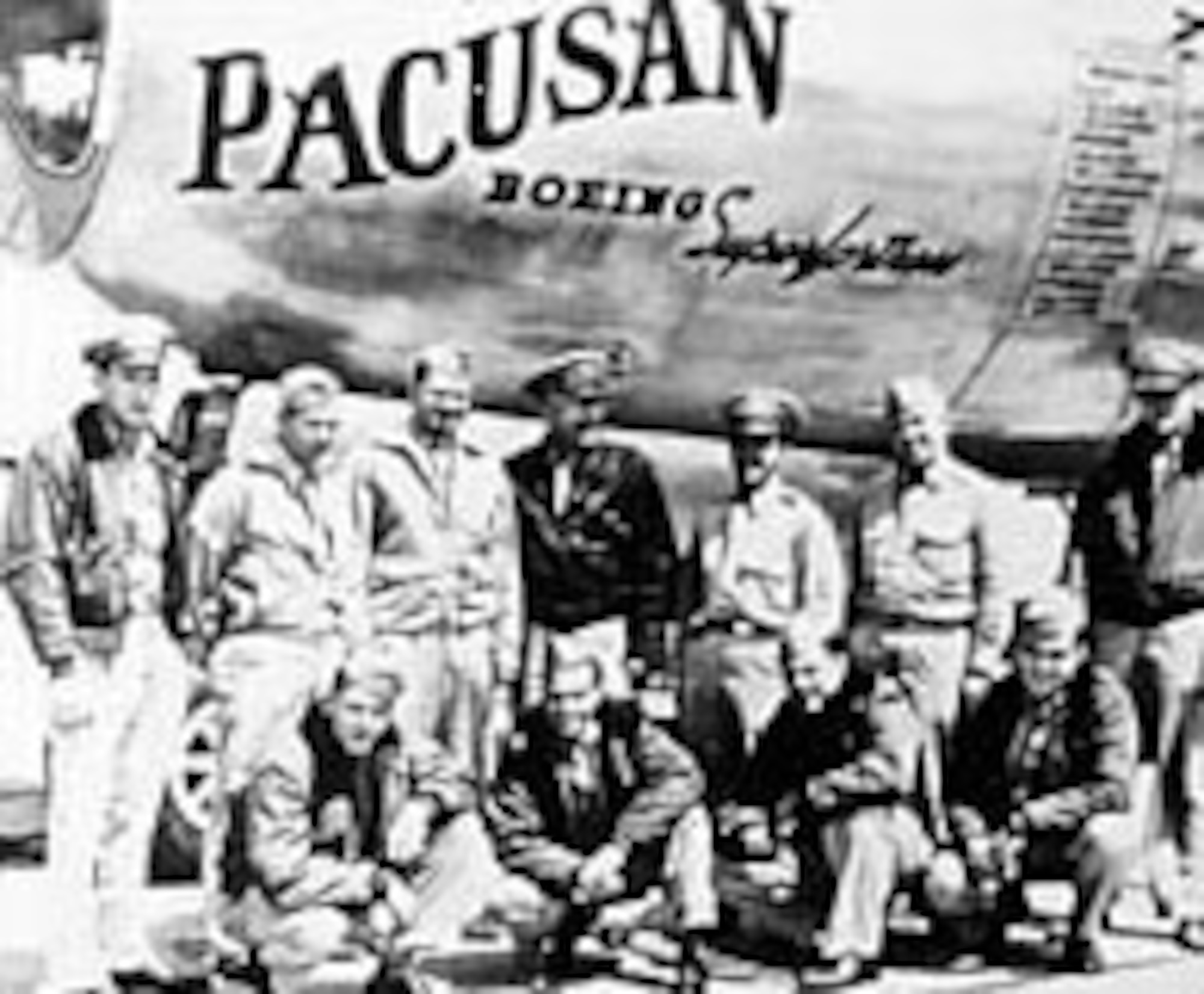 Col. Irvine (center, standing) and his crew, which flew the B-29B "Pacusan Dreambat" on an unrefueled, nonstop 9,500-mile flight on Oct. 4-6, 1946. The flight went from Honolulu to Cairo, Egypt, over the Arctic regions in 39 hours, 36 minutes. The route was chosen for its hazards of winter weather and complicated navigation and communications problems. (U.S. Air Force photo)