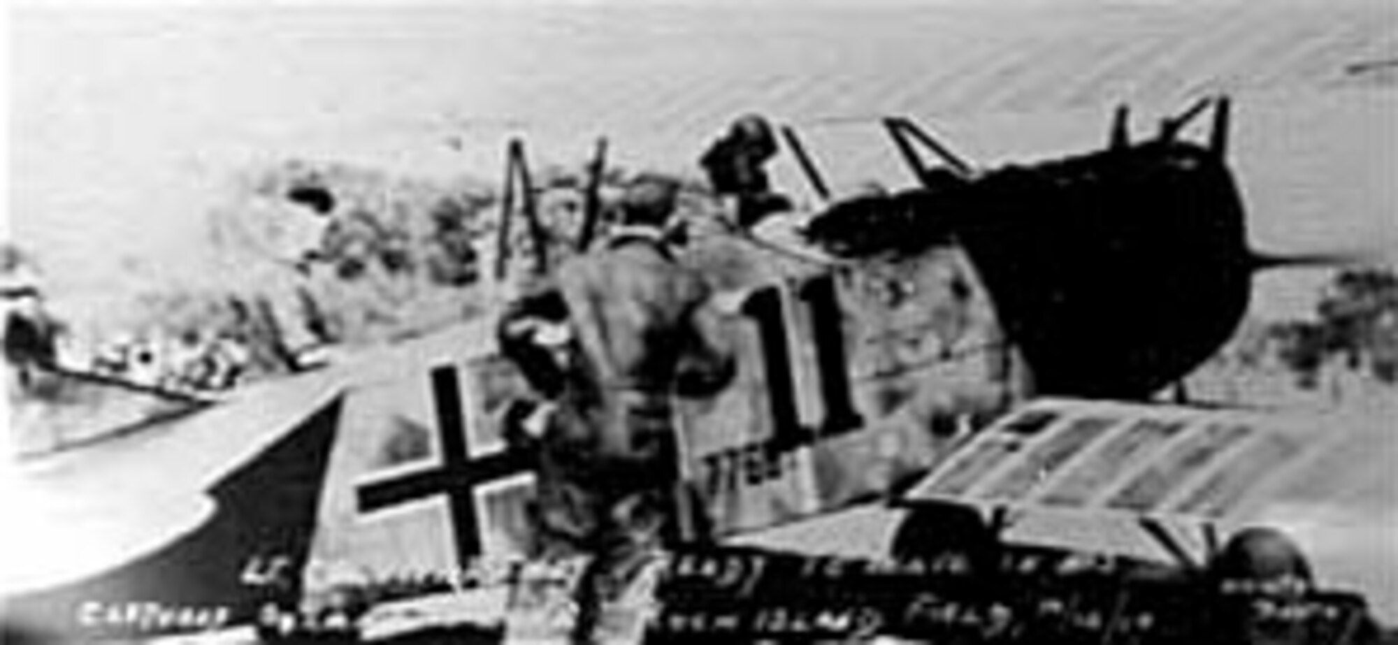 Lt. Col. Harold Hartney, Commanding Officer of the 1st Pursuit Group in France in 1918, climbs into entry No. 11, a captured Fokker D. VII (still bearing German World War I insignia), in Rock Island, Ill., on Oct. 12, 1919. (U.S. Air Force photo)