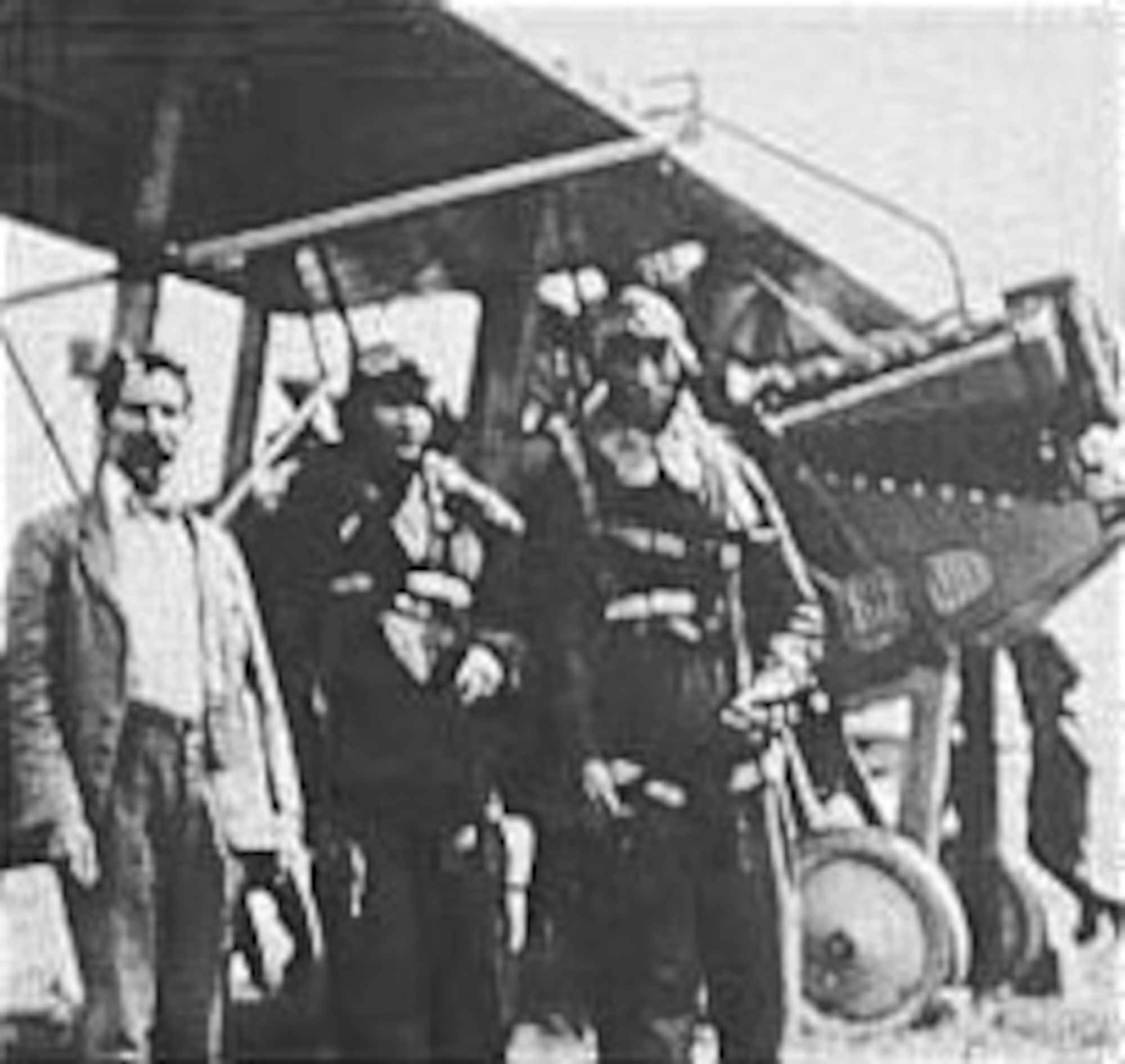 Dr. Sanford Moss (left) with Lt. G.W. Elsey and Capt. Rudolph Schroeder in front of the special LePere LUSAC-11 equipped with an exhaust driven turbo-supercharger built by General Electric. Dr. Moss invented this supercharger and continually improved its design through data obtained during flight tests at McCook Field. (U.S. Air Force photo)