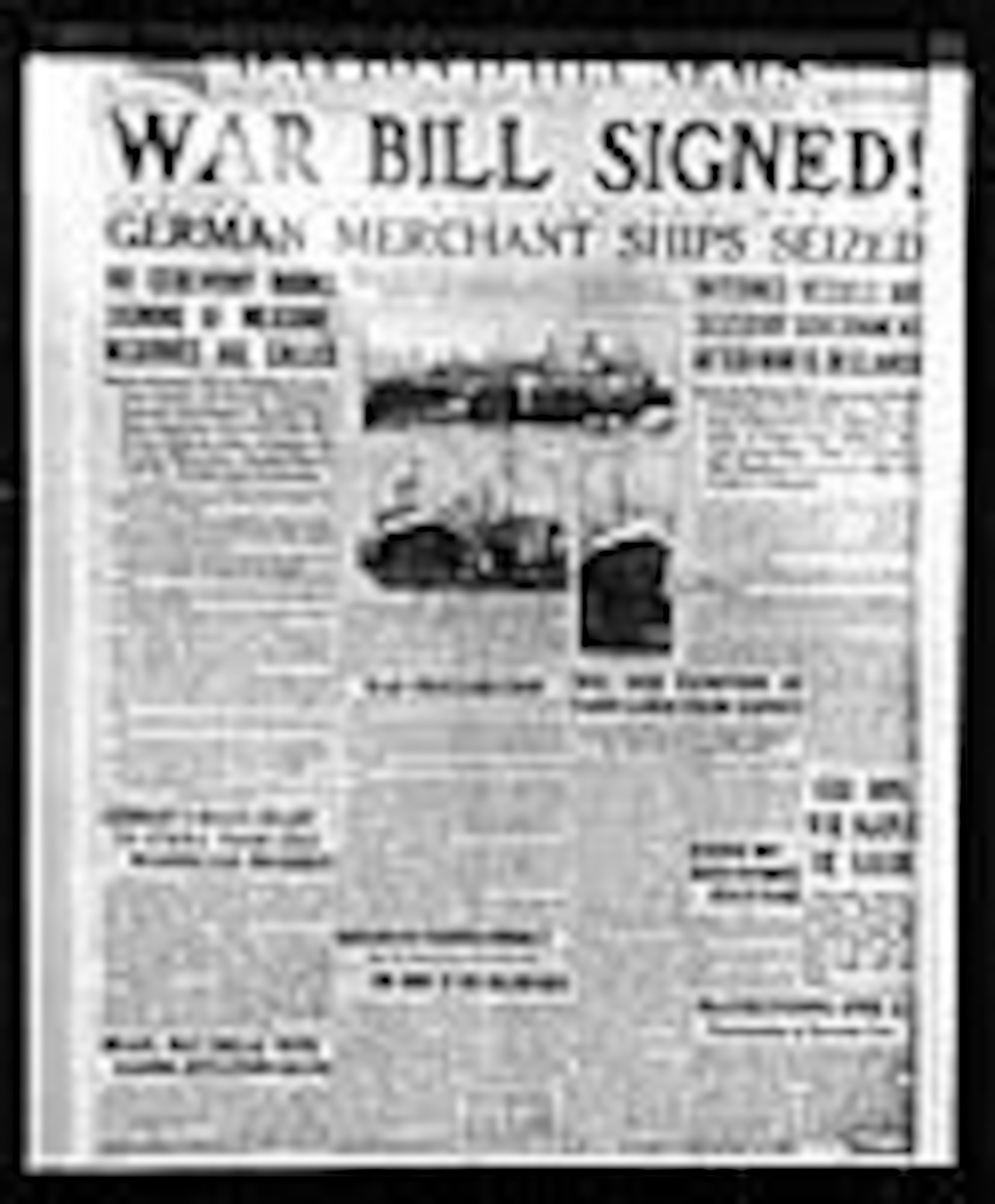 This newspaper headline reads "War bill signed: German merchant ships seized." (U.S. Air Force photo)