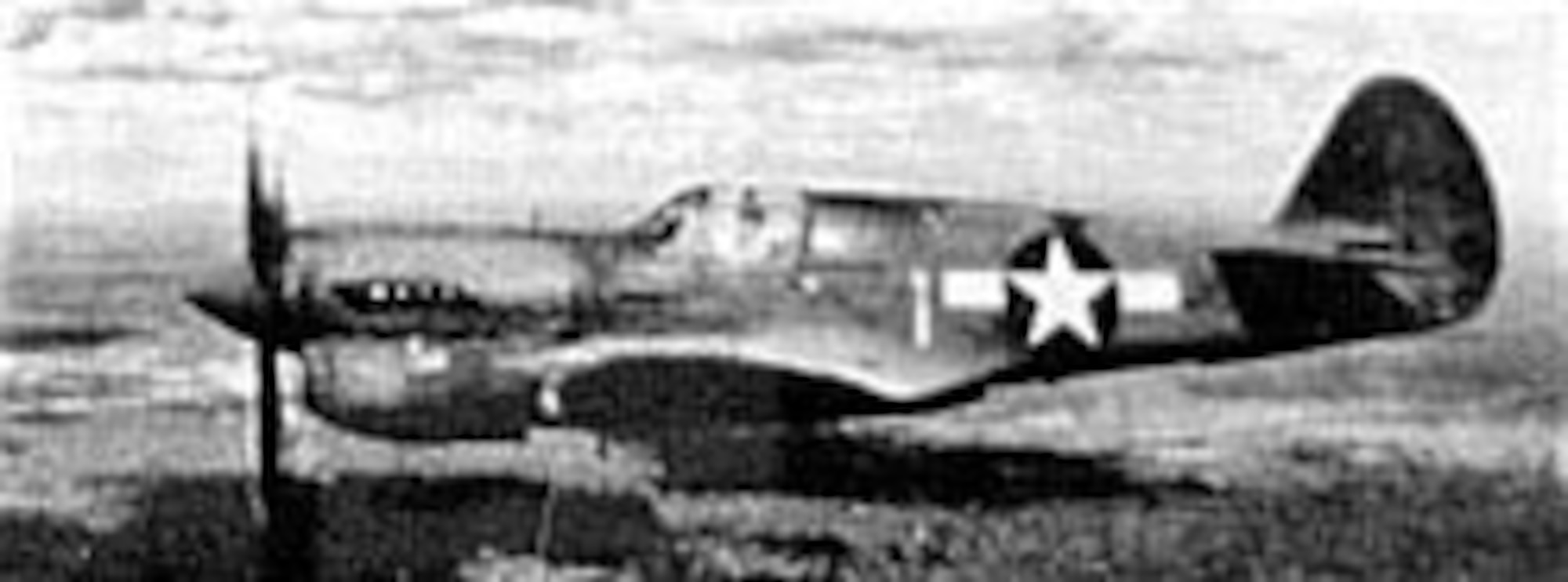 P-40N "Sue" heads for its base in India after dropping its 500-pound bomb on a Japanese supply center in Burma in 1945. (U.S. Air Force photo)