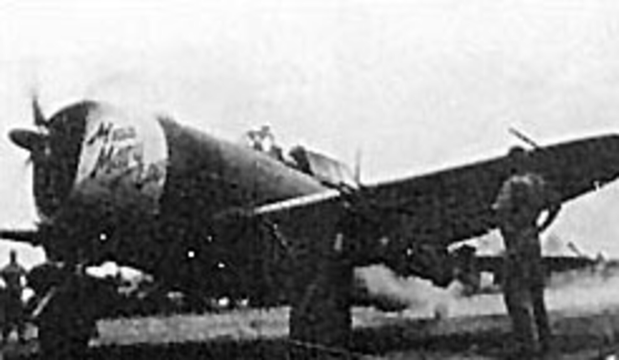 A P-47 carrying two 1,000-pound bombs prepares to take off from Saipan for a strike against Tinian. (U.S. Air Force photo)